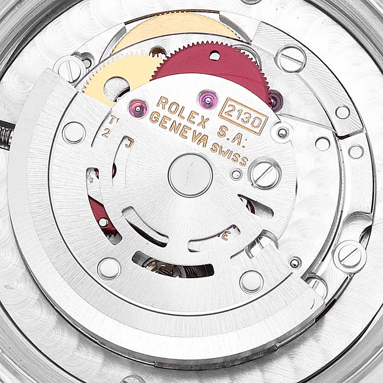 This image shows the internal movement mechanism of a Mid-Size Rolex watch, focusing on its intricate gears and components.