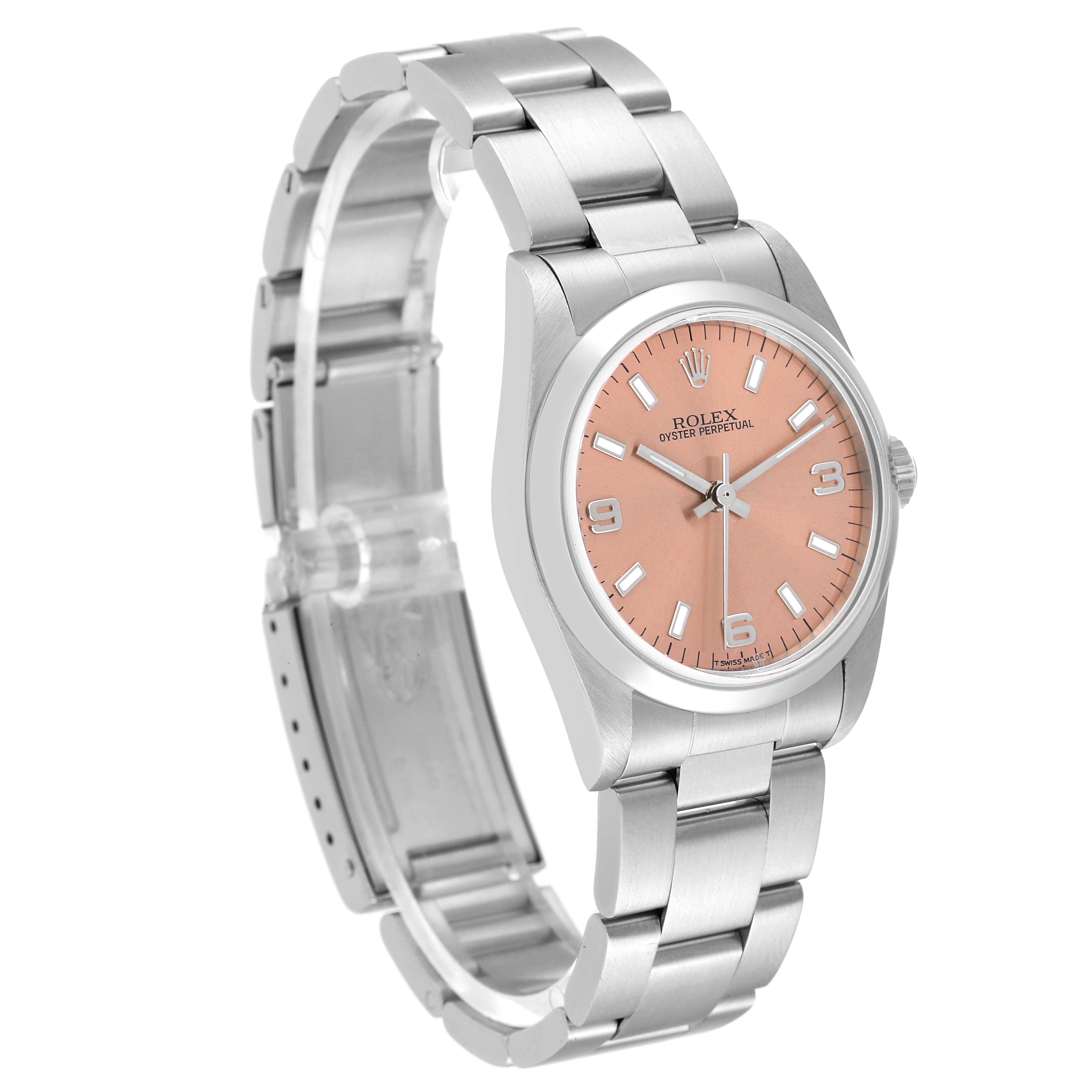 This image shows a Rolex Mid-Size 77080 Women's Stainless Steel Pink Dial 77080 Women's Stainless Steel Pink Dial Oyster Perpetual watch at a three-quarter angle, highlighting its pink dial and stainless steel bracelet.