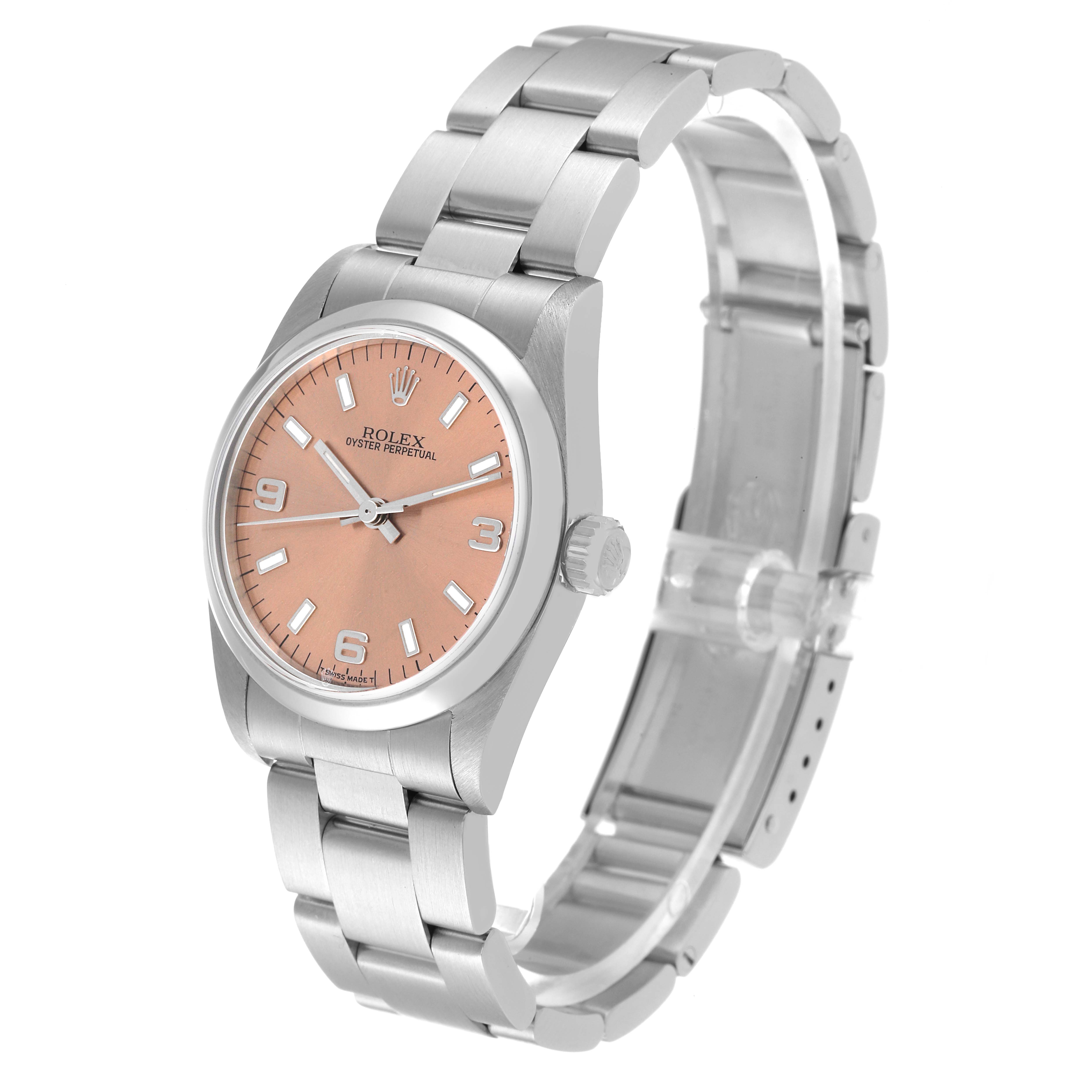 The Rolex Mid-Size 77080 Women's Stainless Steel Pink Dial 77080 Women's Stainless Steel Pink Dial Oyster Perpetual watch is shown at an angle displaying the dial, crown, and bracelet.