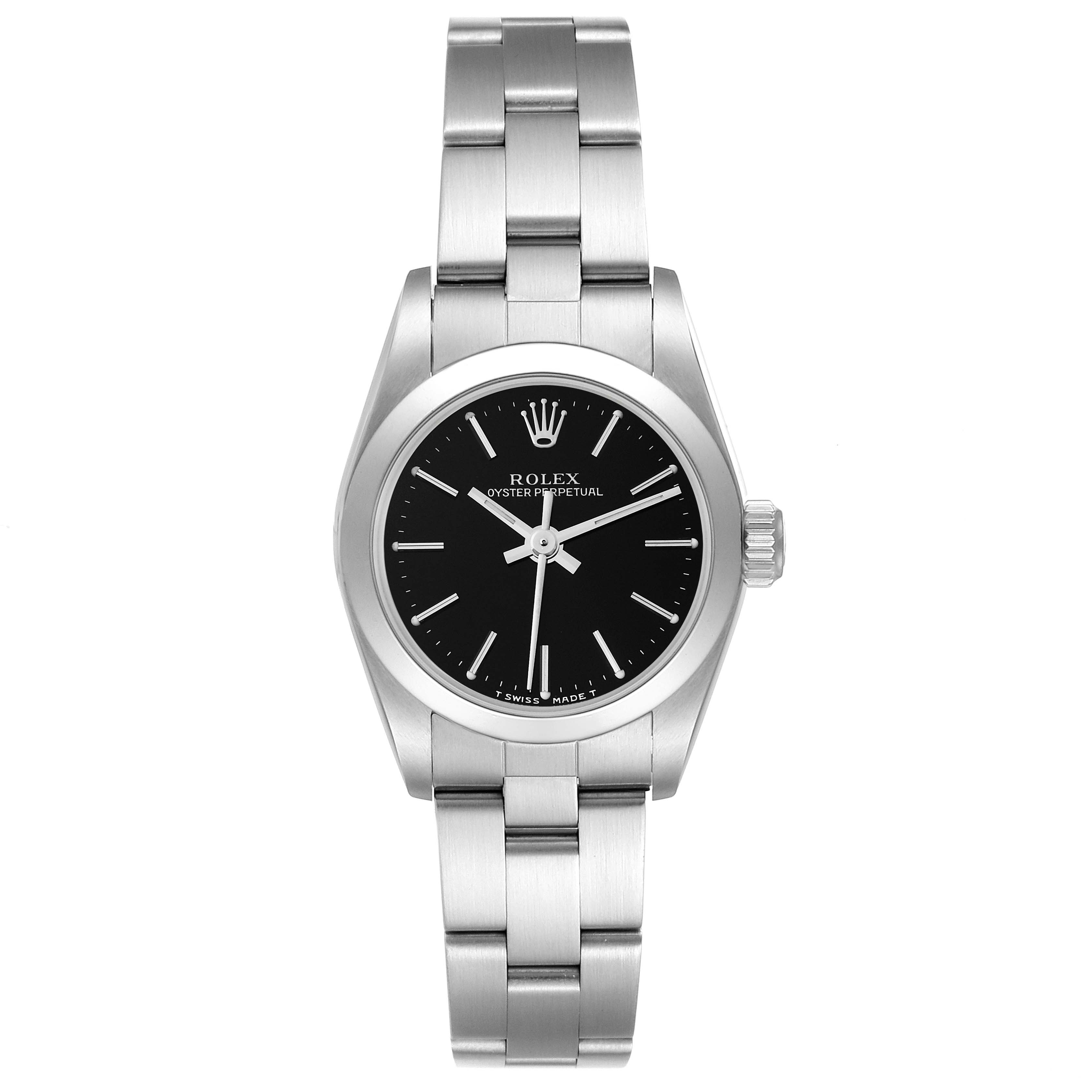 The Rolex Oyster Perpetual 67180 Women's Stainless Steel Black Dial 67180 Women's Stainless Steel Black Dial watch is shown from the front, displaying its black dial, hour markers, hands, and stainless steel bracelet.