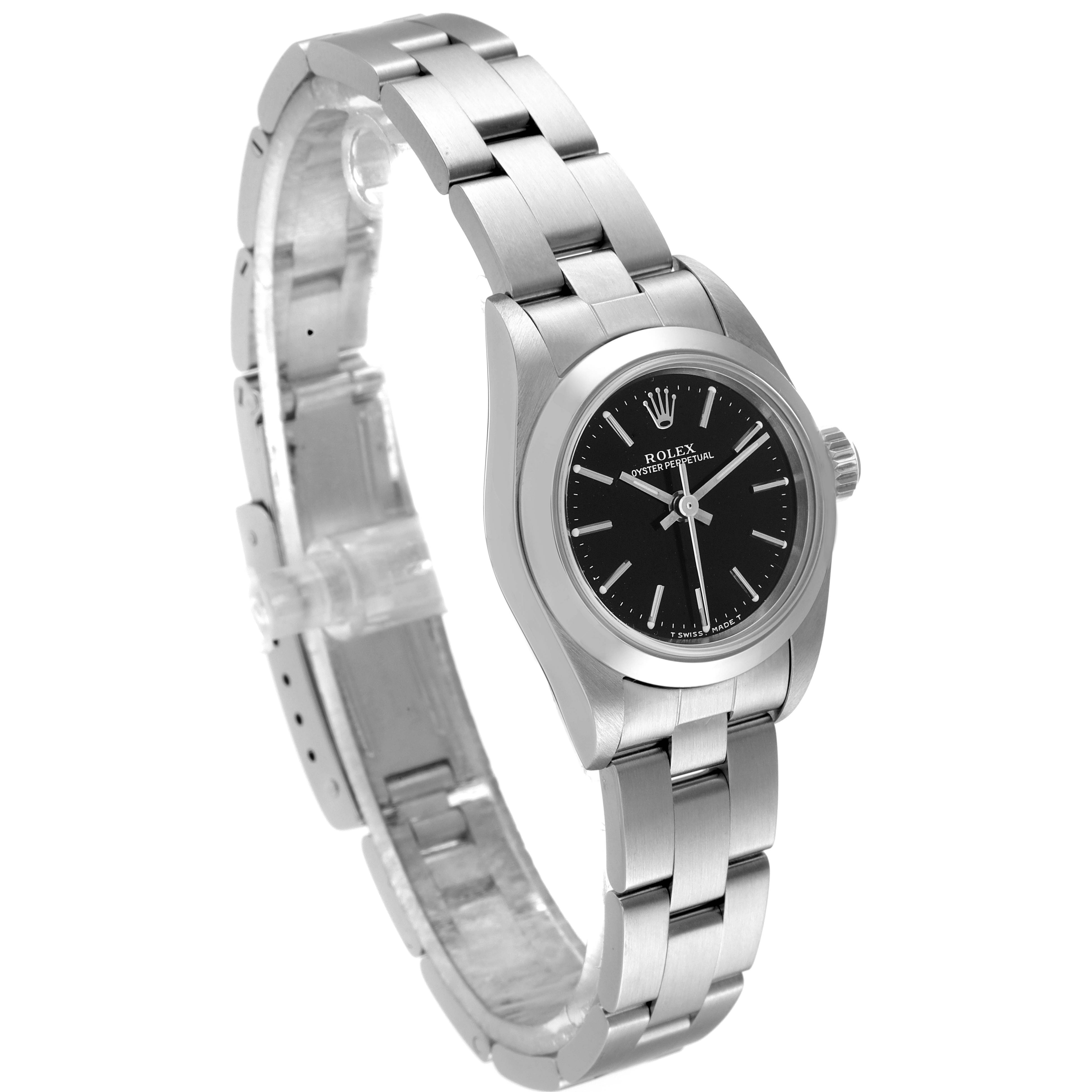 The image shows a side angle of a Rolex Oyster Perpetual 67180 Women's Stainless Steel Black Dial 67180 Women's Stainless Steel Black Dial watch with a black dial and a stainless steel bracelet.