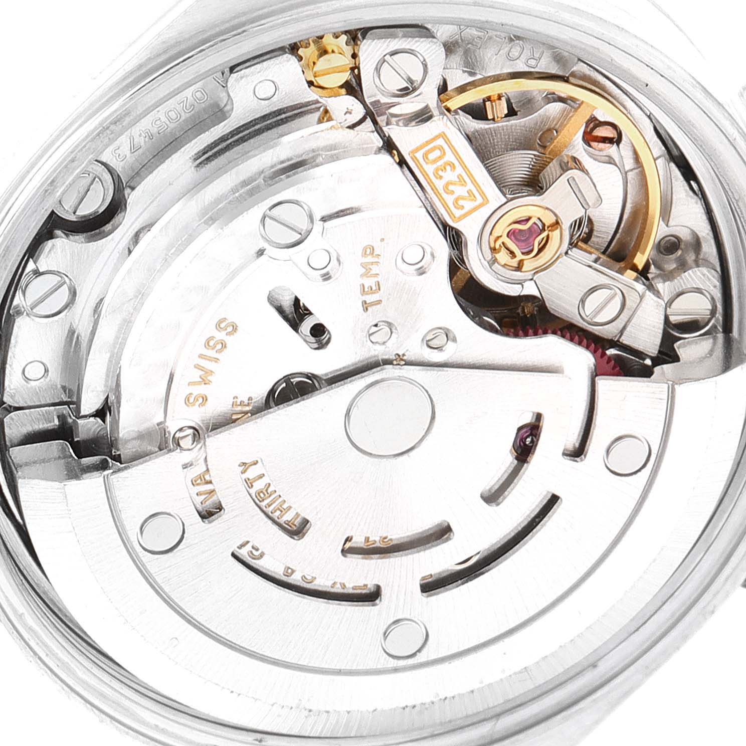 This image shows the intricate inner mechanical movement of a Rolex Oyster Perpetual 76080 Women
s Stainless Steel Pink Dial 76080 Women
s Stainless Steel Pink Dial watch, captured from the back.