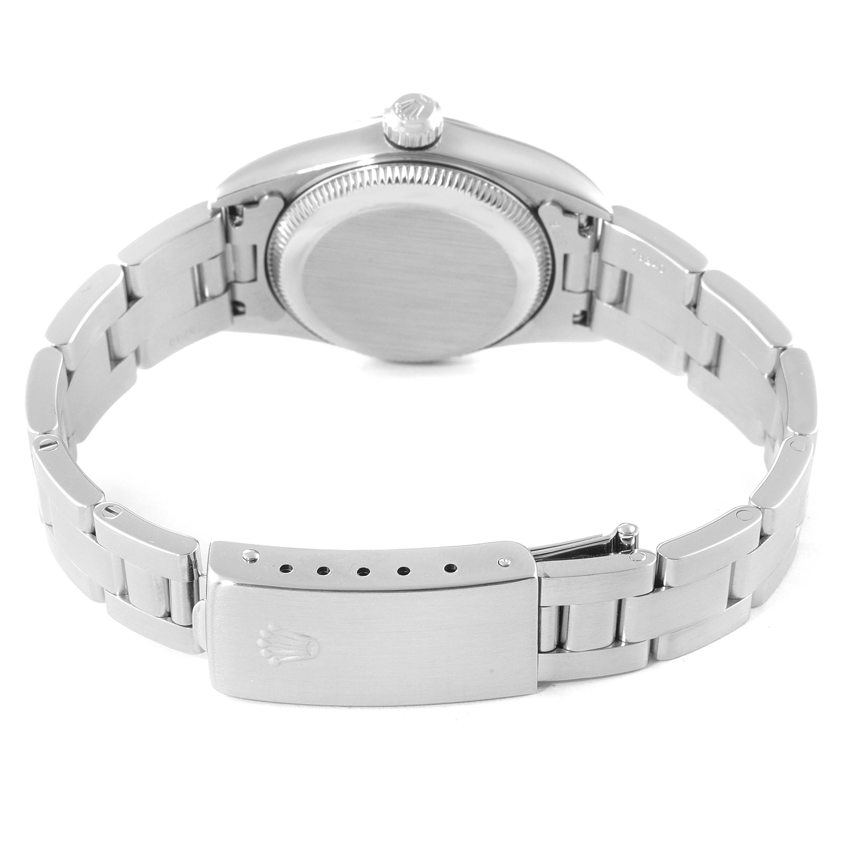 The image shows the back and clasp of a Rolex Oyster Perpetual 76080 Women
s Stainless Steel Pink Dial 76080 Women
s Stainless Steel Pink Dial watch from a rear angle.