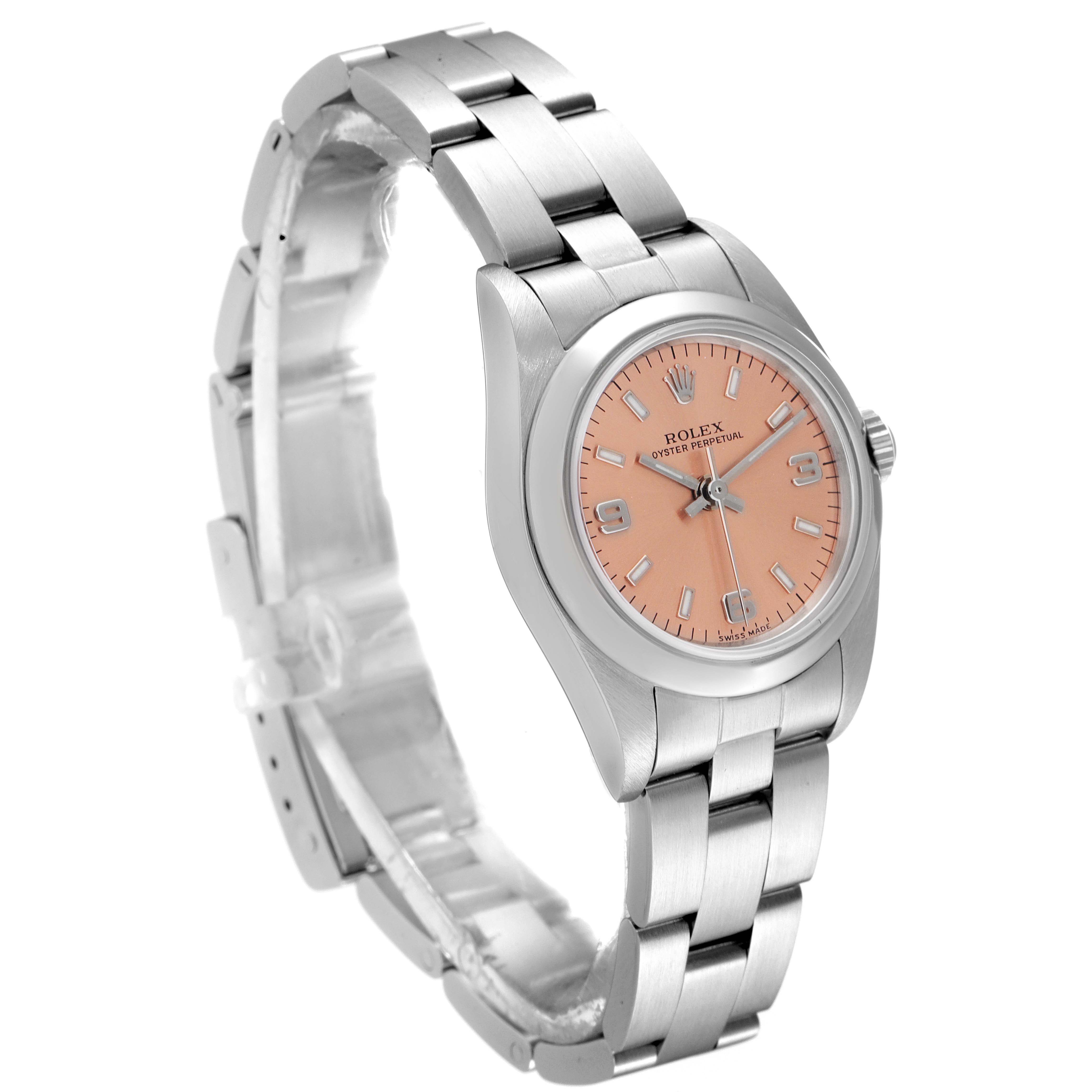 The image shows a Rolex Oyster Perpetual 76080 Women
s Stainless Steel Pink Dial 76080 Women
s Stainless Steel Pink Dial watch at a slight side angle, highlighting the bracelet and pink dial.