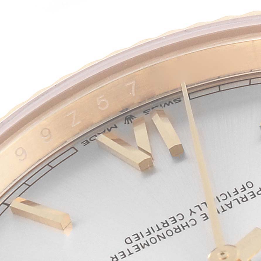 This image shows a close-up of the dial, hands, and part of the bezel of the Rolex President 228238 Men
s Yellow Gold Silver Dial 228238 Men
s Yellow Gold Silver Dial model watch.