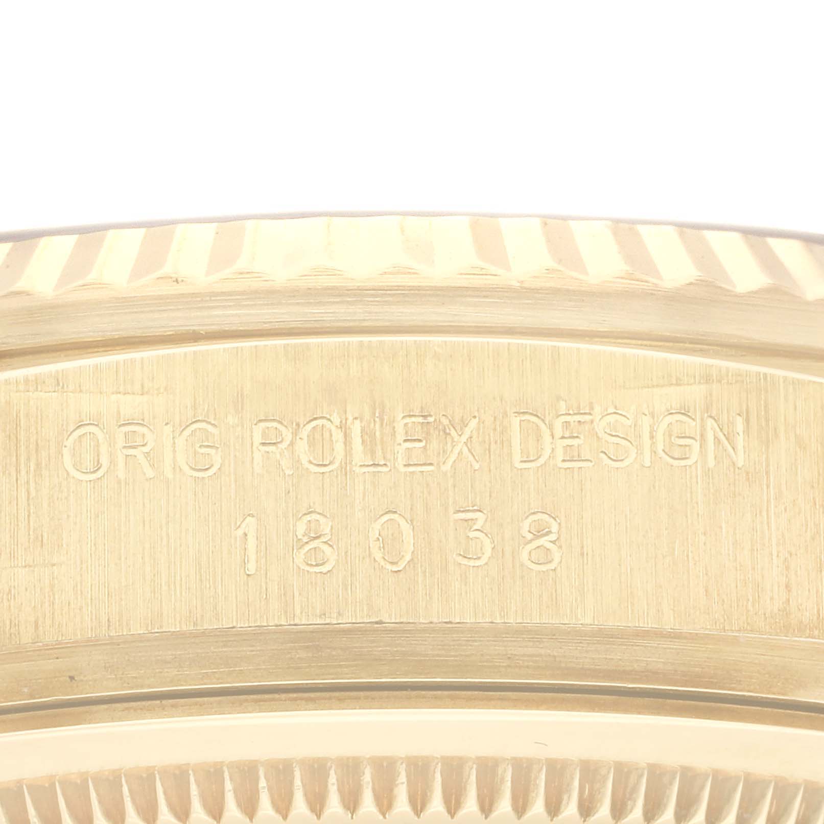 This close-up image shows the case back and model number of a Rolex President 18038 Men's Yellow Gold Champagne Dial 18038 Men's Yellow Gold Champagne Dial watch, model 18038.