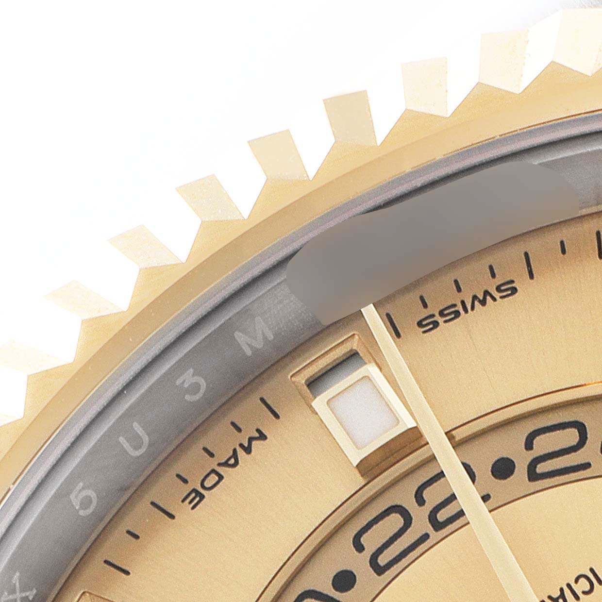 The image shows a close-up of the dial and bezel of a Rolex Sky-Dweller 326933 Men's Steel and Gold (two tone) Champagne Dial 326933 Men's Steel and Gold (two tone) Champagne Dial watch.