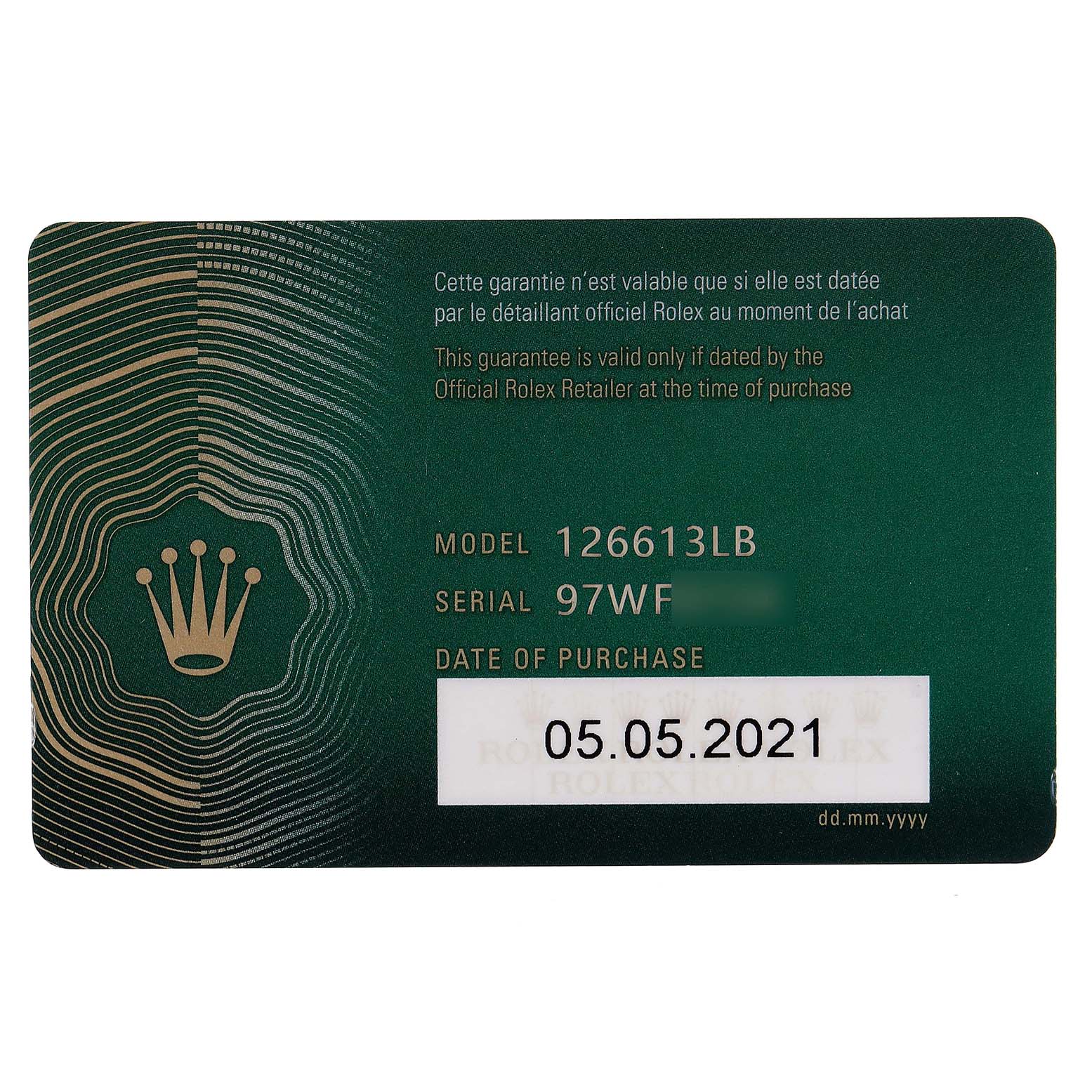 This image shows the warranty card displaying the model number, serial number, and purchase date for a Rolex Submariner 126613 Men's Steel and Gold (two tone) Blue Dial 126613 Men's Steel and Gold (two tone) Blue Dial.