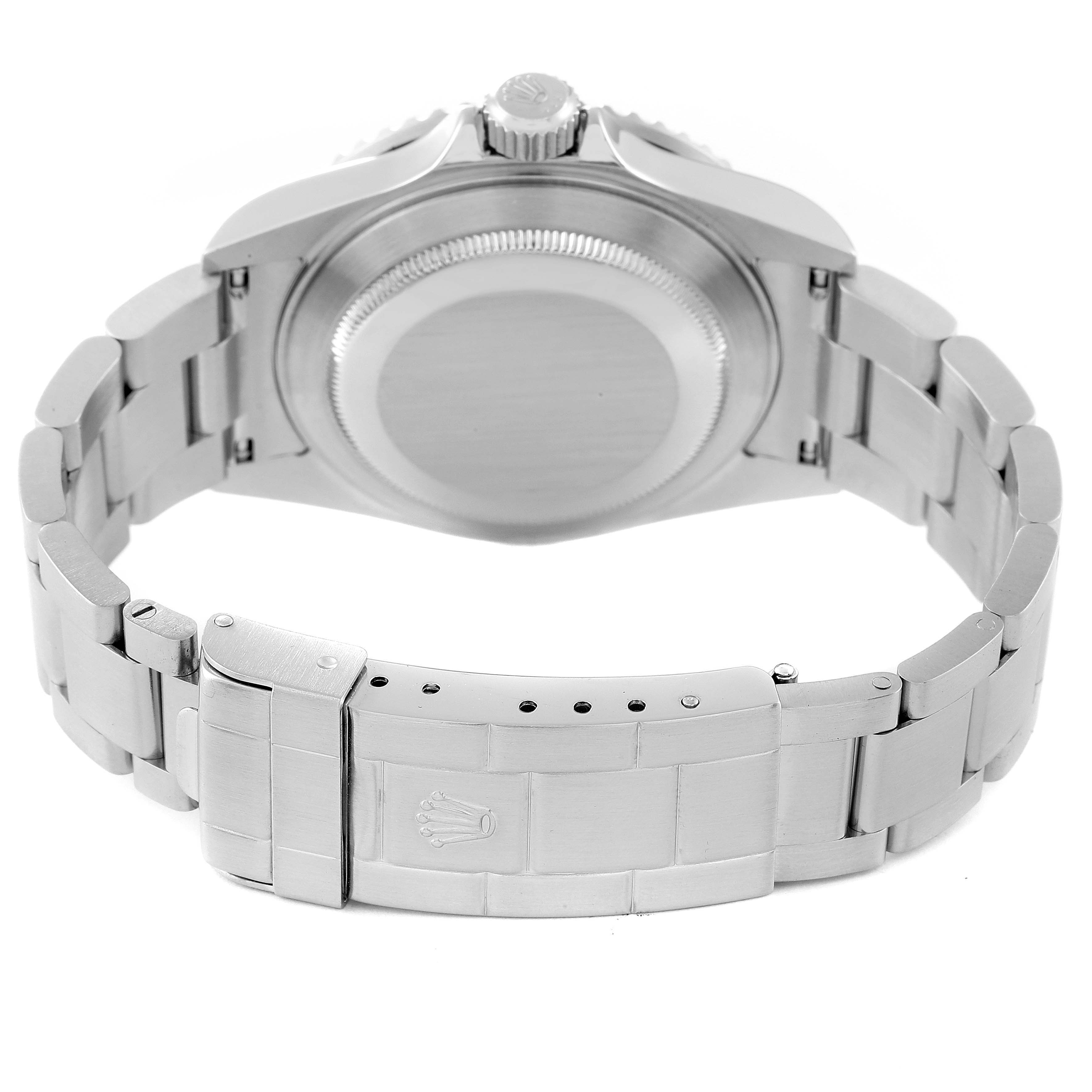 A rear view of the Rolex Submariner 16610T Men
s Stainless Steel Black Dial 16610T Men
s Stainless Steel Black Dial showing the case back, bracelet, and clasp.