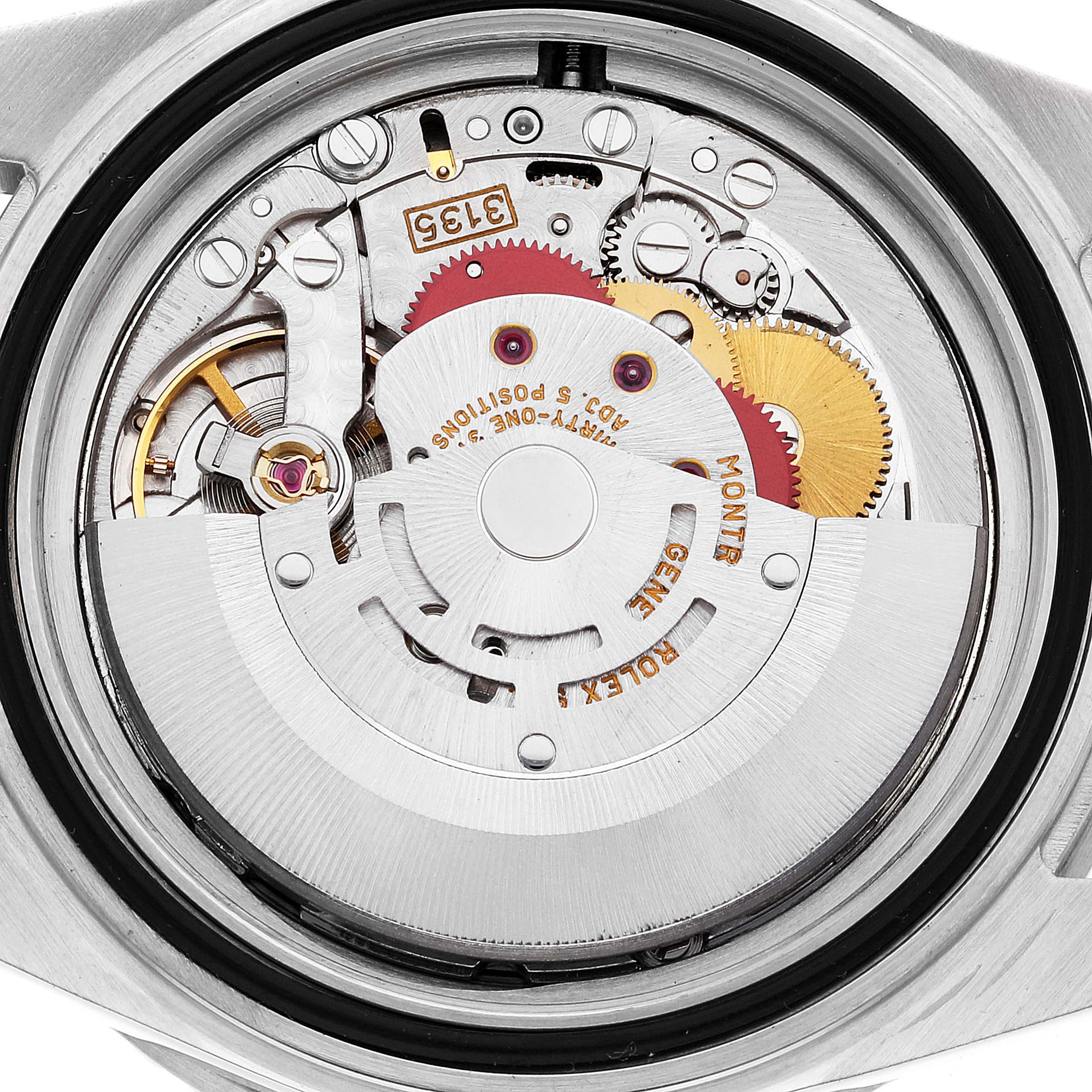 The image shows the internal movement and components of a Rolex Submariner 16610 Men
s Stainless Steel Black Dial 16610 Men
s Stainless Steel Black Dial watch from the back.