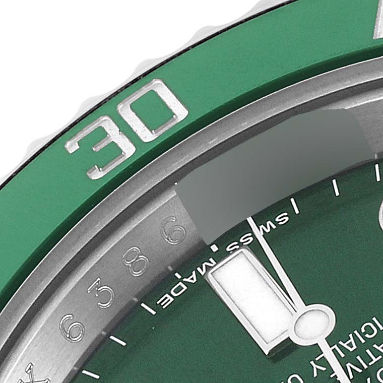 This close-up image features the green bezel and part of the dial and hands of a Rolex Submariner 116610LV Men's Stainless Steel Green Dial 116610LV Men's Stainless Steel Green Dial watch.
