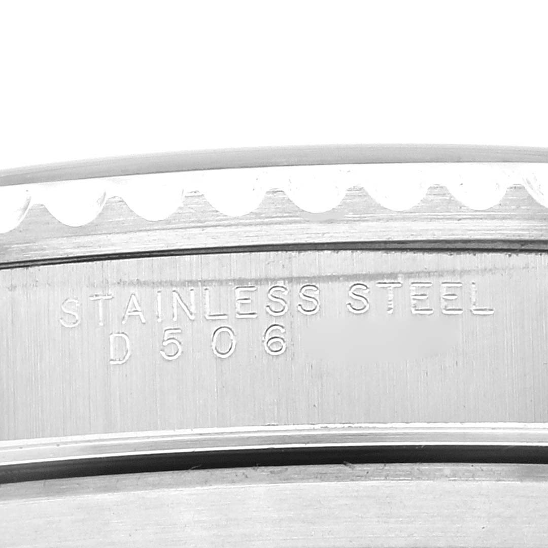 This close-up image shows the stainless steel bezel engraving of the Rolex Submariner 14060M Men
s Stainless Steel Black Dial 14060M Men
s Stainless Steel Black Dial model.