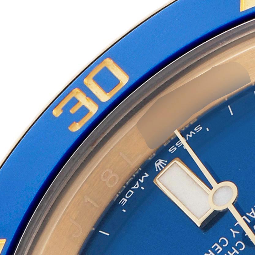 The image shows a close-up of the blue bezel and part of the dial of a Rolex Submariner 126618LB Men's Yellow Gold Blue Dial 126618LB Men's Yellow Gold Blue Dial watch, highlighting the number "30."