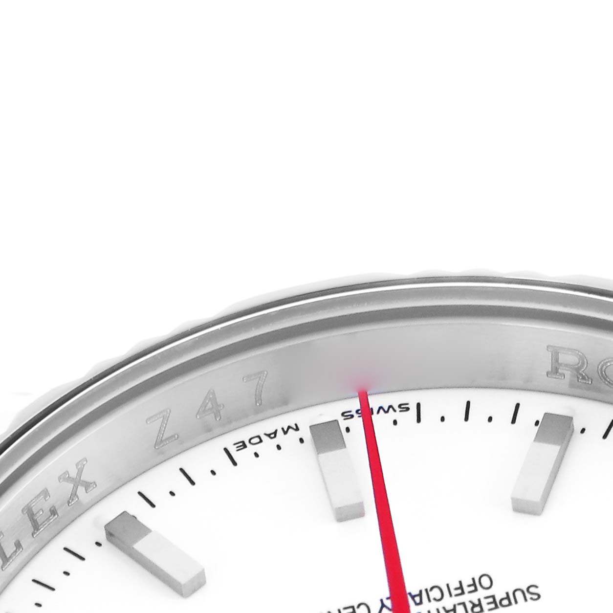 The image shows a close-up of the Turn-o-Graph's dial and bezel from Rolex, highlighting the indices and red second hand.