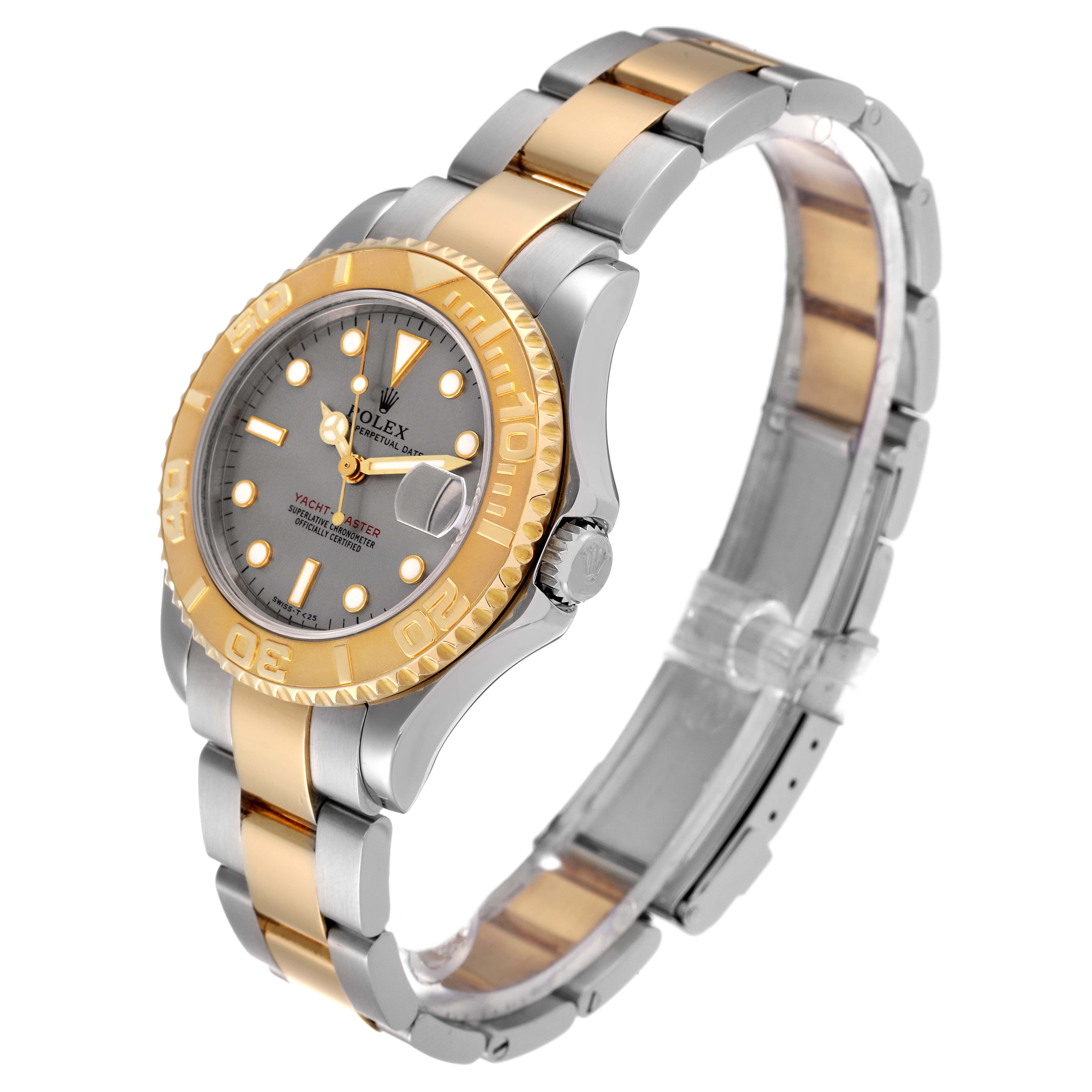 The Rolex Yacht-Master 68623 Men
s Steel and Gold (two tone) Grey Dial 68623 Men
s Steel and Gold (two tone) Grey Dial watch is shown at an angle displaying the dial, bezel, part of the bracelet, and clasp.