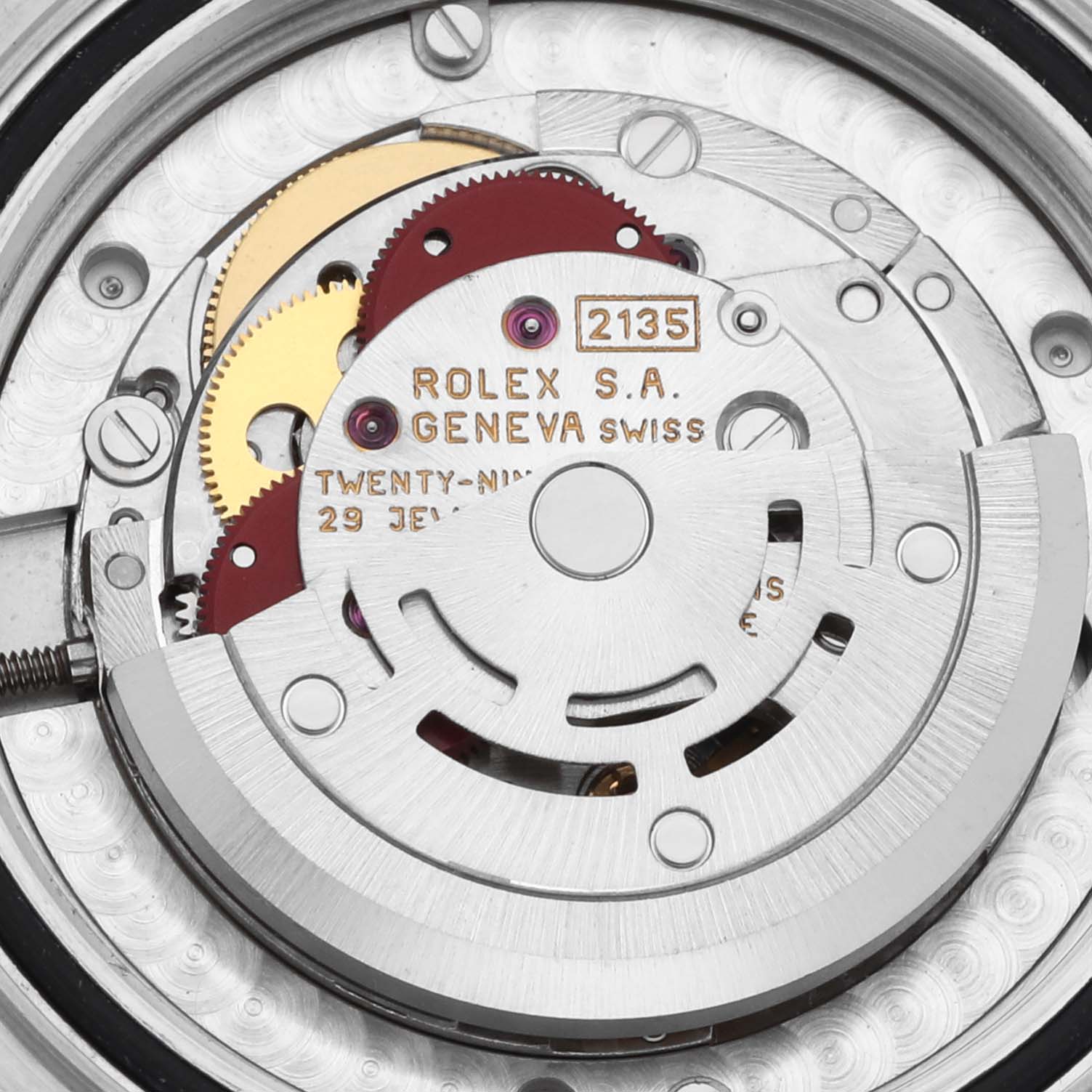 The image shows a detailed, close-up view of the movement inside a Rolex Yacht-Master 68623 Men's Steel and Gold (two tone) Blue Dial 68623 Men's Steel and Gold (two tone) Blue Dial watch, featuring gears and inscriptions.