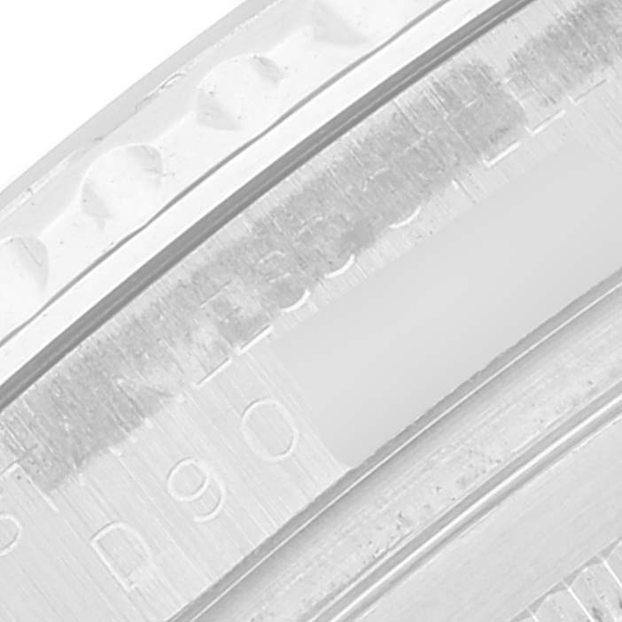 The image shows a close-up of the engraved edge of a Rolex Yacht-Master 16622 Men's Stainless Steel Silver Dial 16622 Men's Stainless Steel Silver Dial watch bezel.