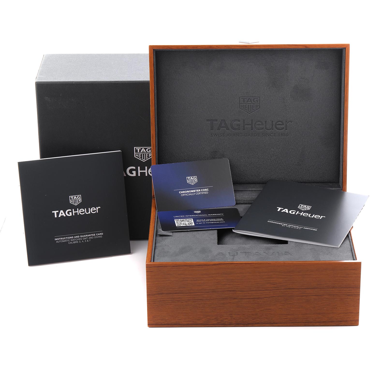 The image shows the packaging and documents for a Tag Heuer Autavia WBE5191.FC8276 Men's Bronze Brown Dial WBE5191.FC8276 Men's Bronze Brown Dial, including the box, warranty card, and manuals.