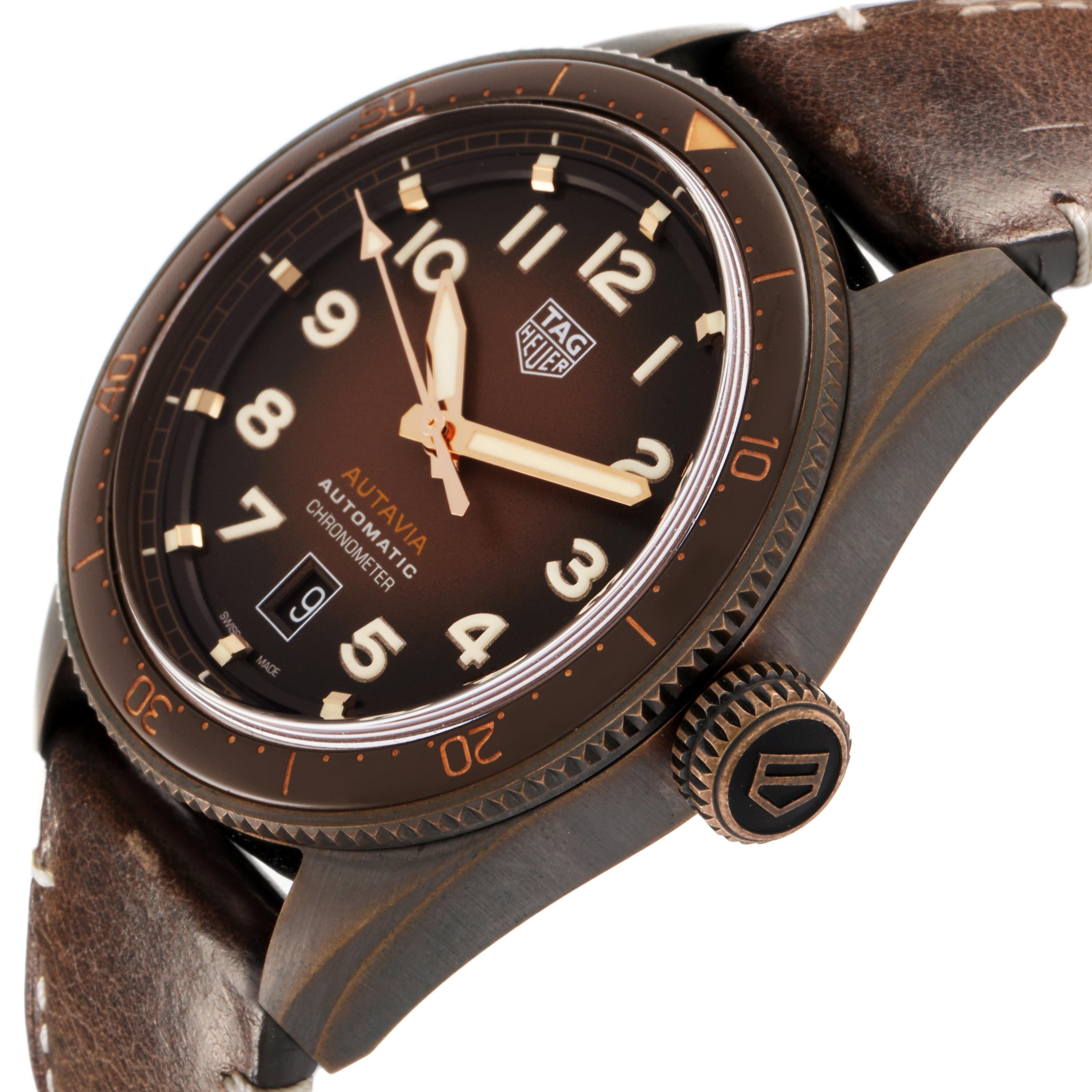 The Tag Heuer Autavia WBE5191.FC8276 Men's Bronze Brown Dial WBE5191.FC8276 Men's Bronze Brown Dial watch is shown at a slight angle, highlighting its brown dial, bezel, crown, and leather strap.