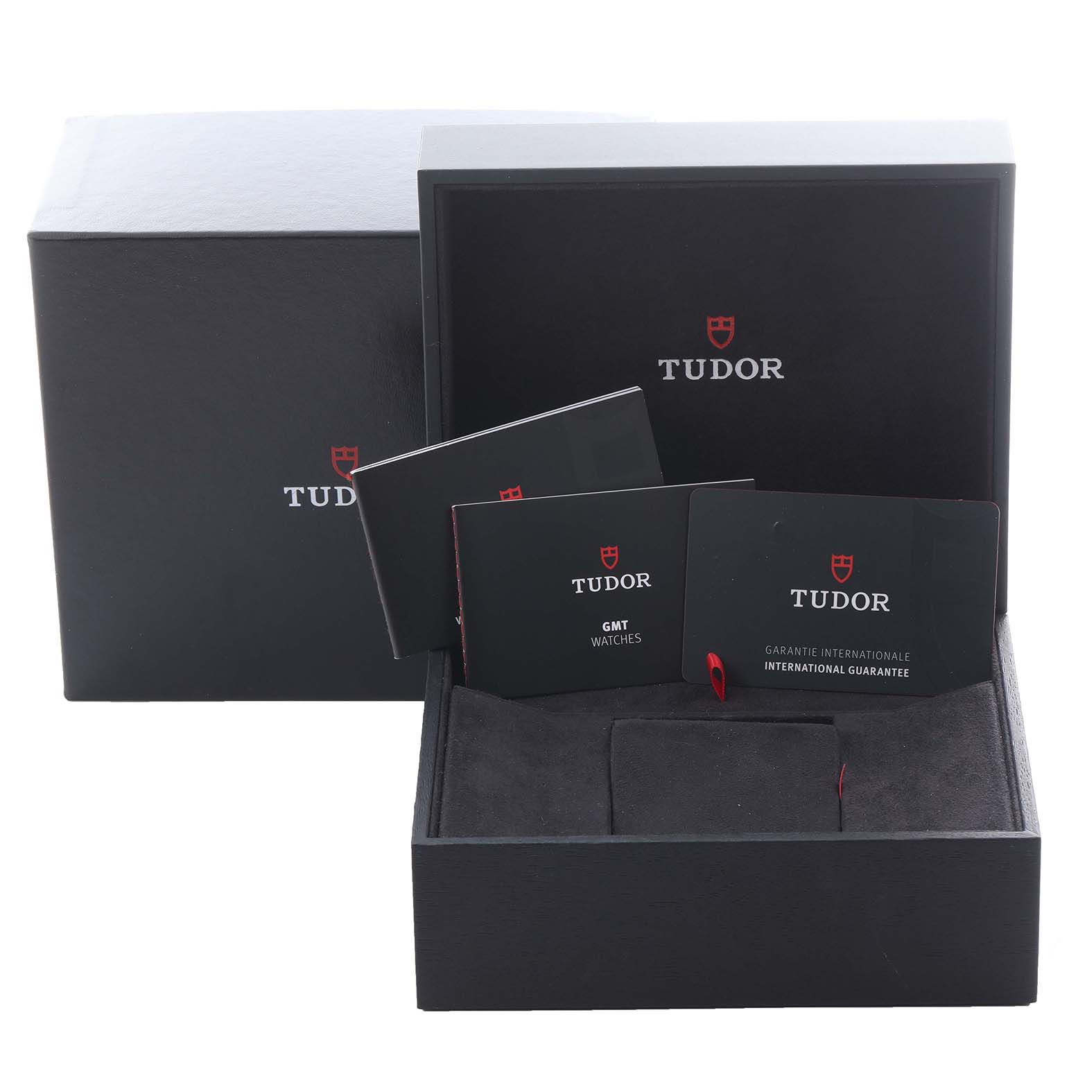 The image shows the Tudor Heritage Black Bay 79830RB Men's Stainless Steel Black Dial 79830RB Men's Stainless Steel Black Dial packaging with the box, manuals, and warranty card.