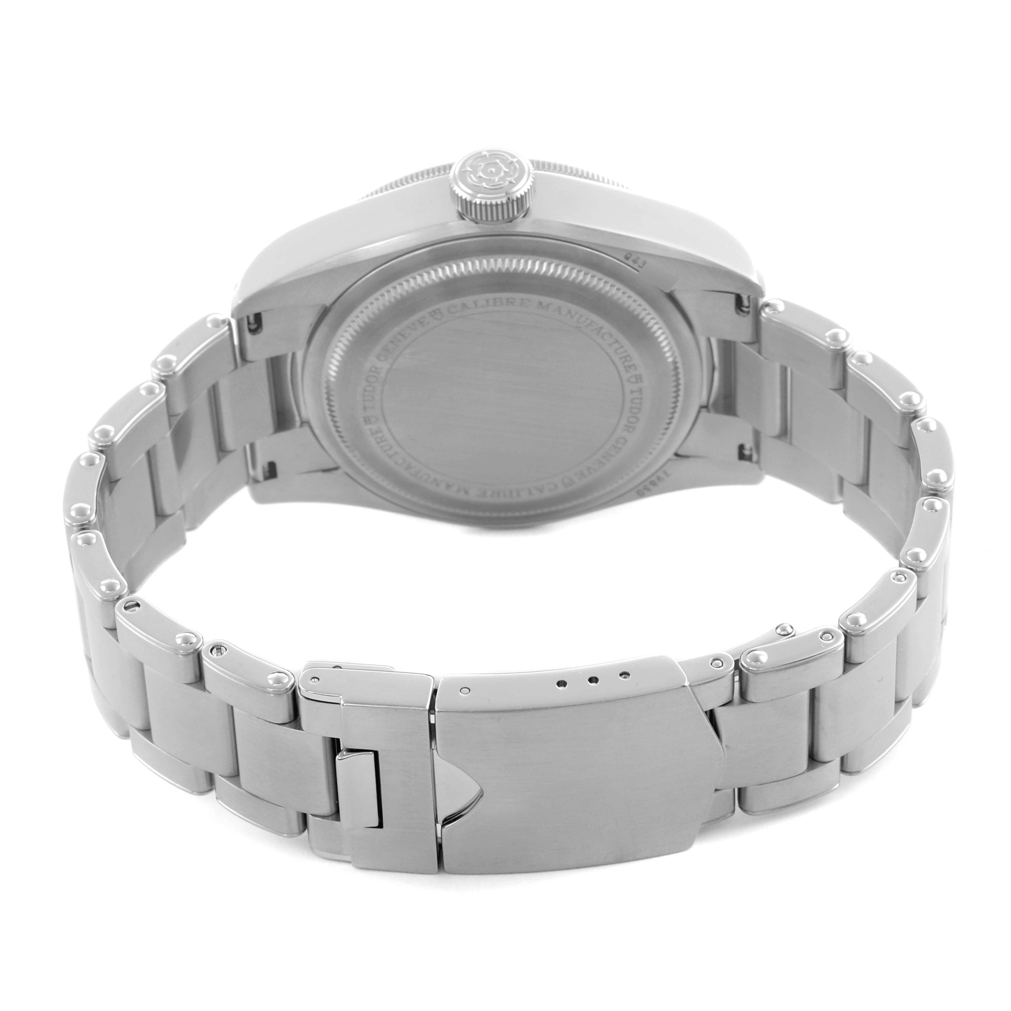 The image shows the rear case and bracelet of a Tudor Heritage Black Bay 79830RB Men's Stainless Steel Black Dial 79830RB Men's Stainless Steel Black Dial watch from a slightly elevated angle.