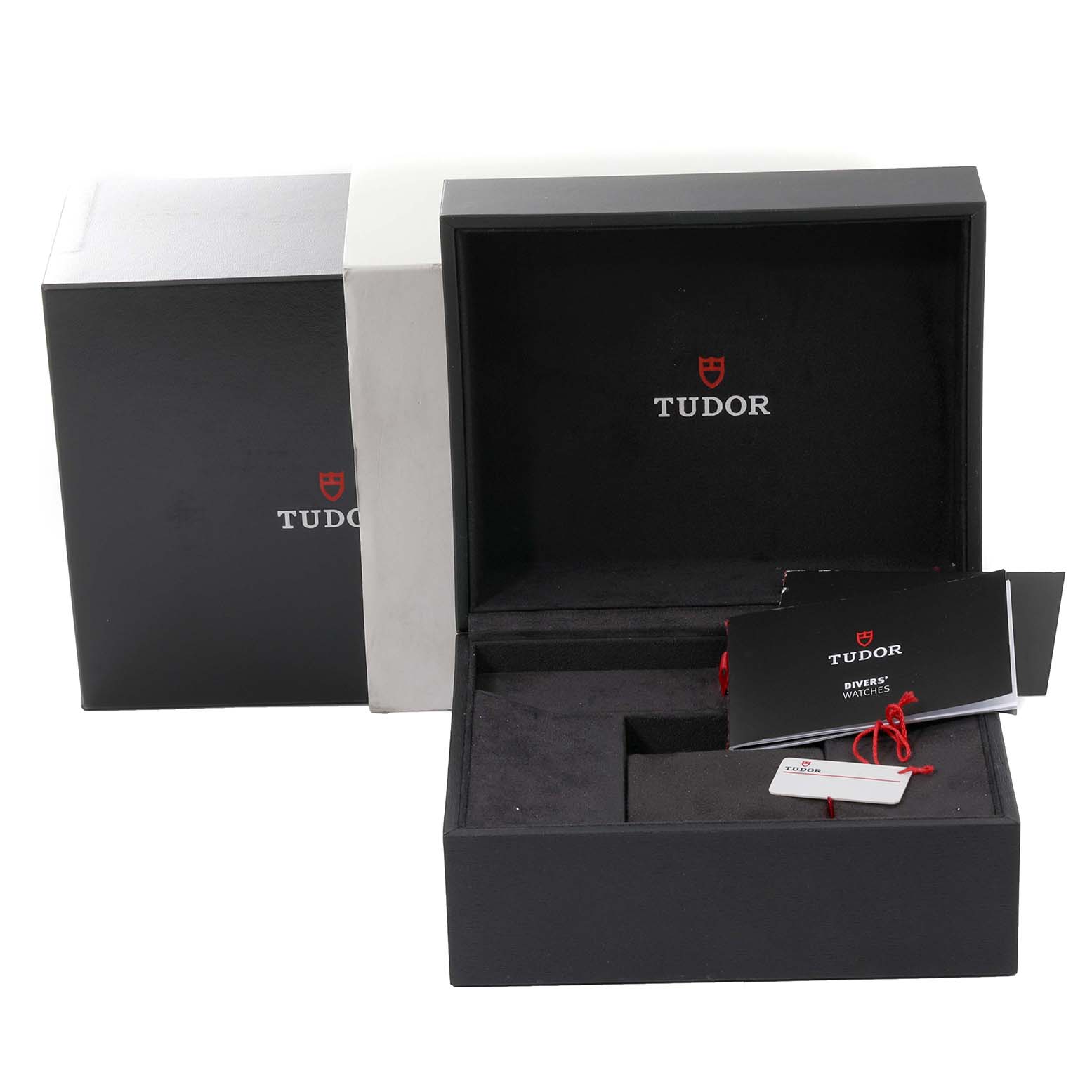 The image shows the open box, outer box, manual, and tags for the Tudor Heritage Black Bay 79230R Men's Stainless Steel Black Dial 79230R Men's Stainless Steel Black Dial watch.