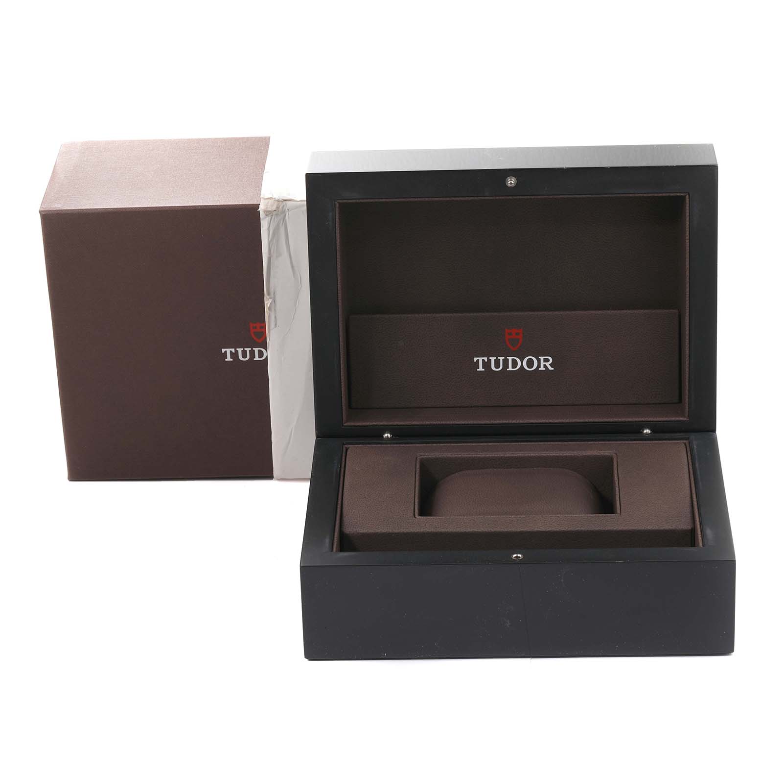 The image shows an open Tudor Heritage Black Bay 79830RB Men's Stainless Steel Black Dial 79830RB Men's Stainless Steel Black Dial watch box and its outer packaging from a front angle.
