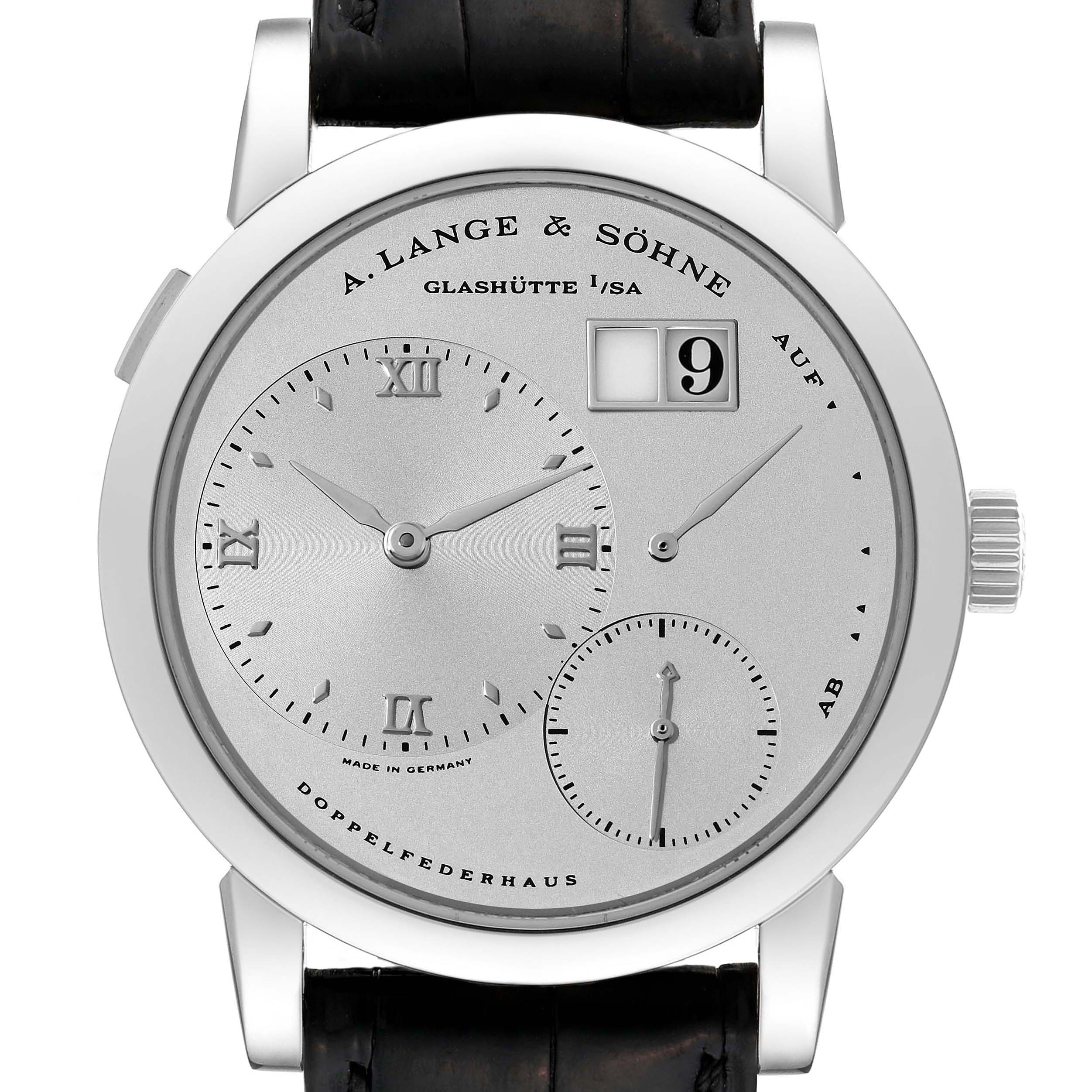 The image shows a frontal view of a Lange 1 watch by A. Lange 
Söhne, highlighting its dials and date window.