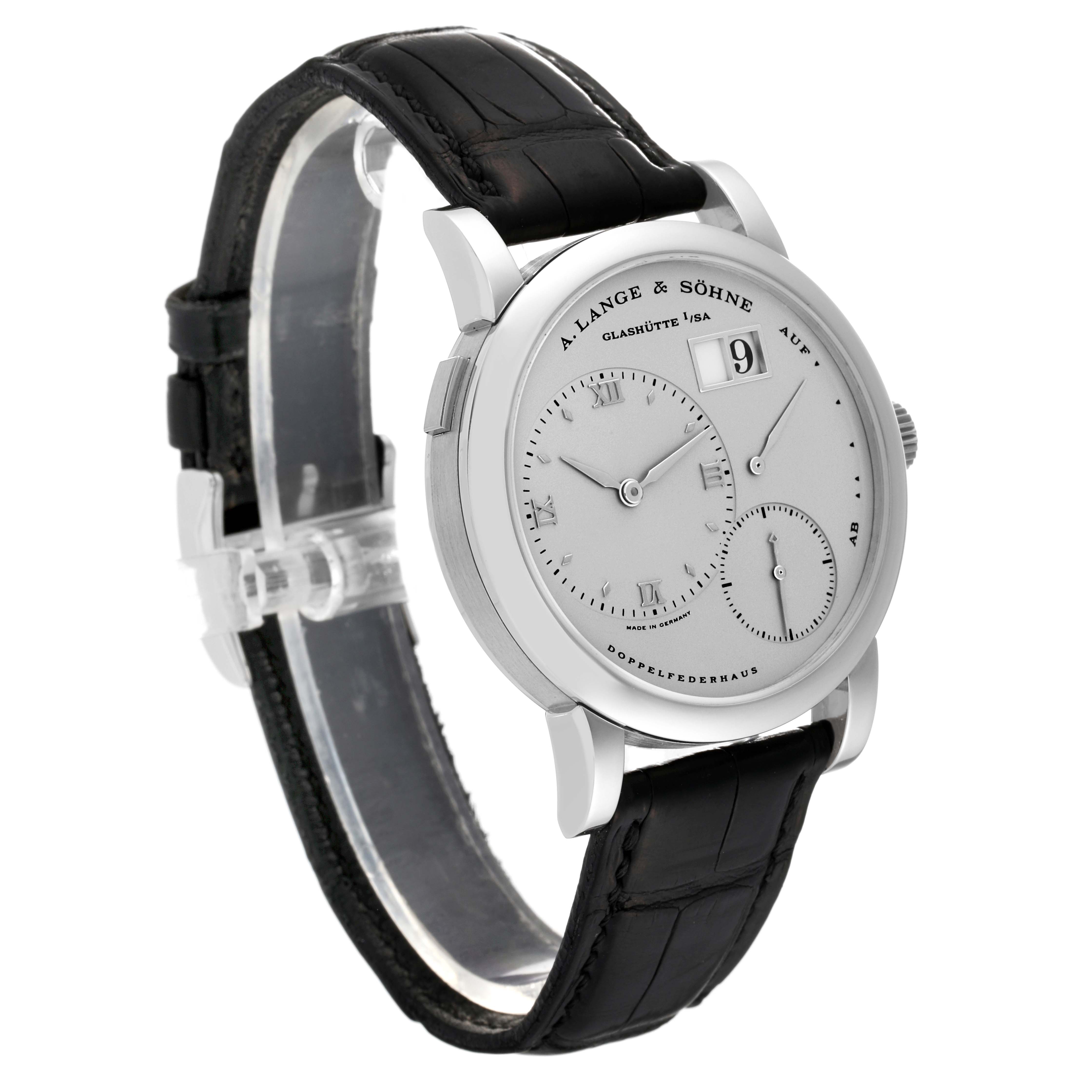 The image shows a side angle view of a Lange 1 model by A. Lange 
Söhne, featuring the watch face, strap, and crown.