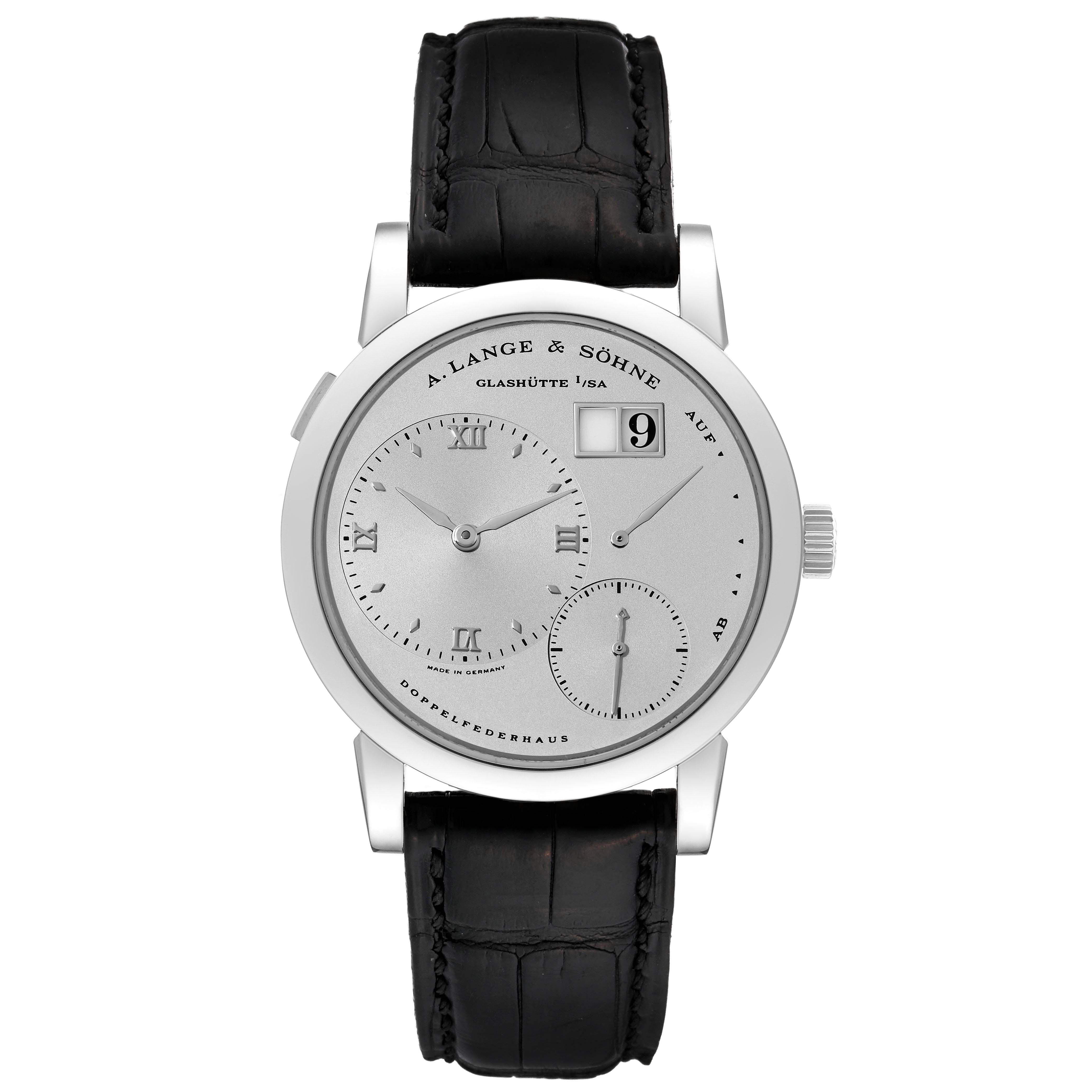 This image displays a frontal view of the Lange 1 watch by A. Lange 
Söhne, including the watch face, dial, and black leather strap.