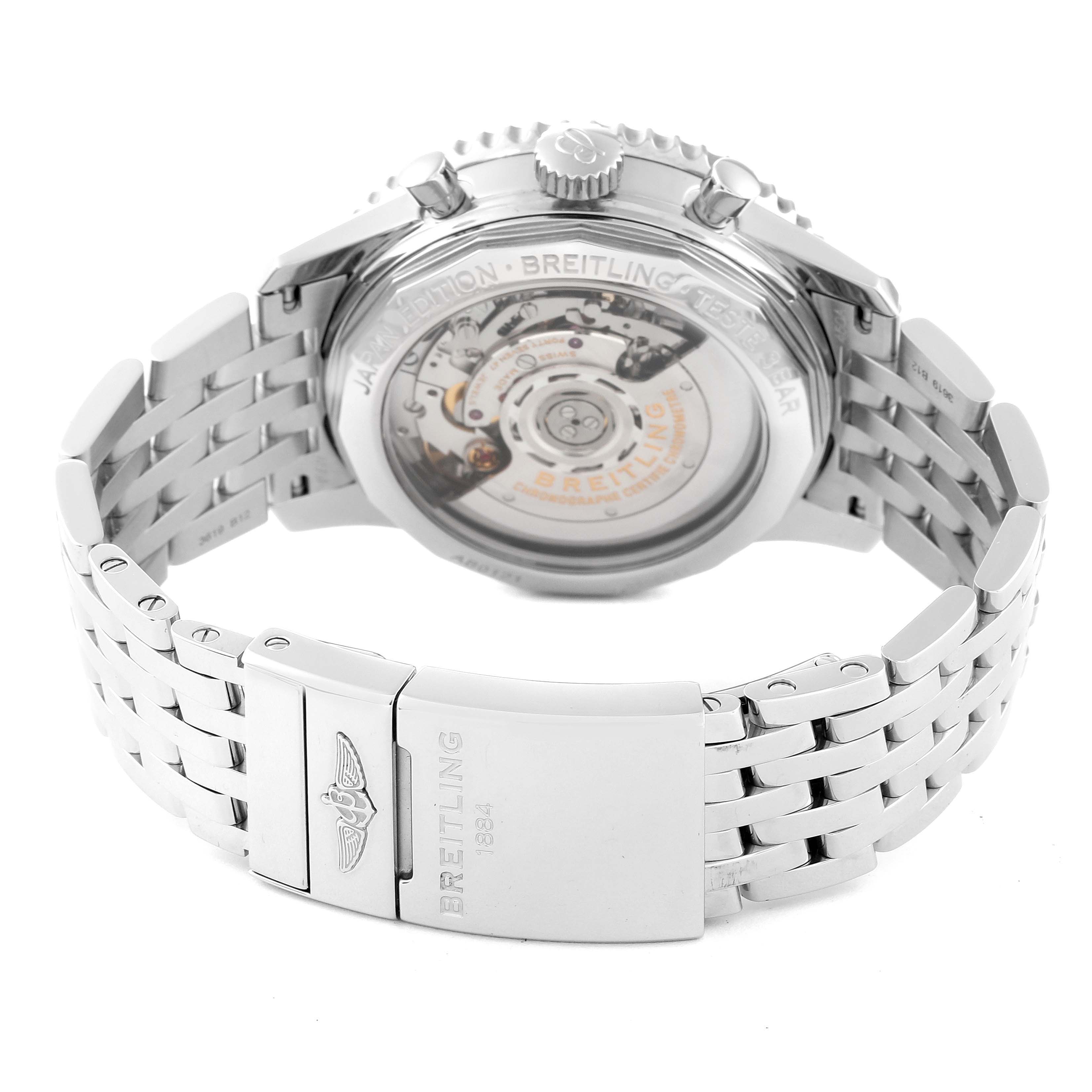 The image shows the back case and bracelet of a Breitling Limited Series watch, highlighting its clasp and mechanical movement.