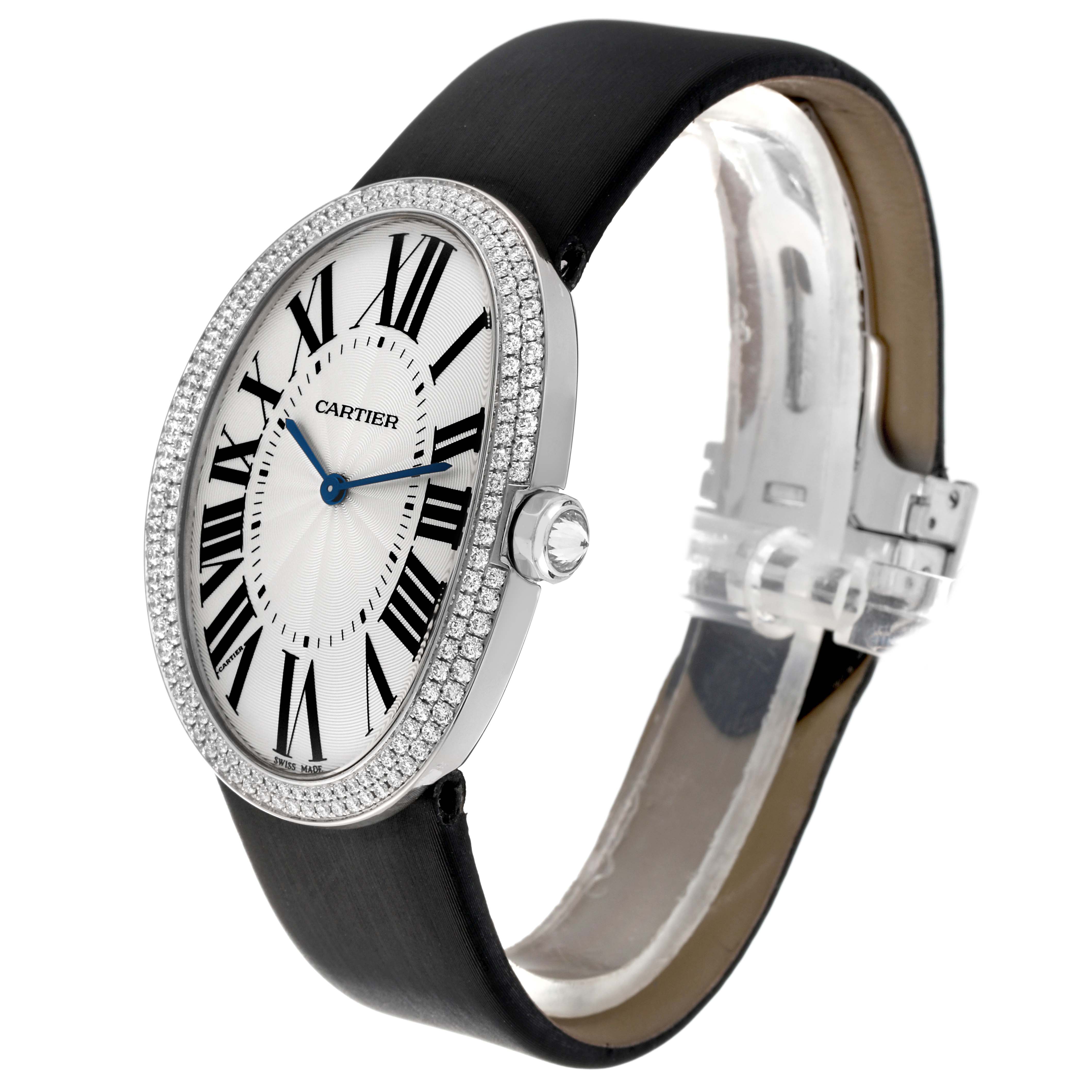 This image shows a side angle of the Cartier Baignoire WB520009 Women's White Gold Silver Dial WB520009 Women's White Gold Silver Dial watch displaying the face, bezel, crown, and partially the strap.