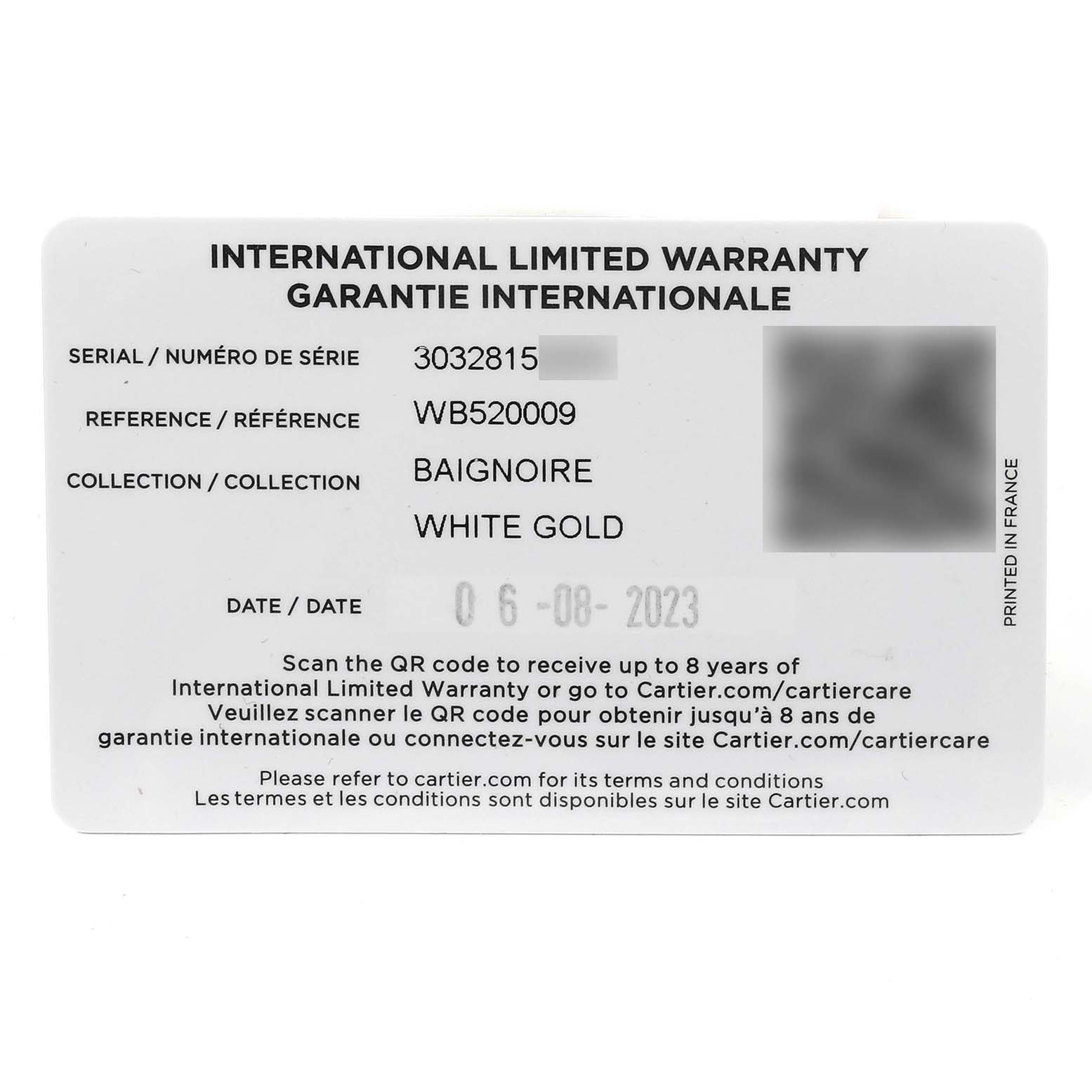 The image shows the front side of an international limited warranty card for the Cartier Baignoire WB520009 Women's White Gold Silver Dial WB520009 Women's White Gold Silver Dial model in white gold.