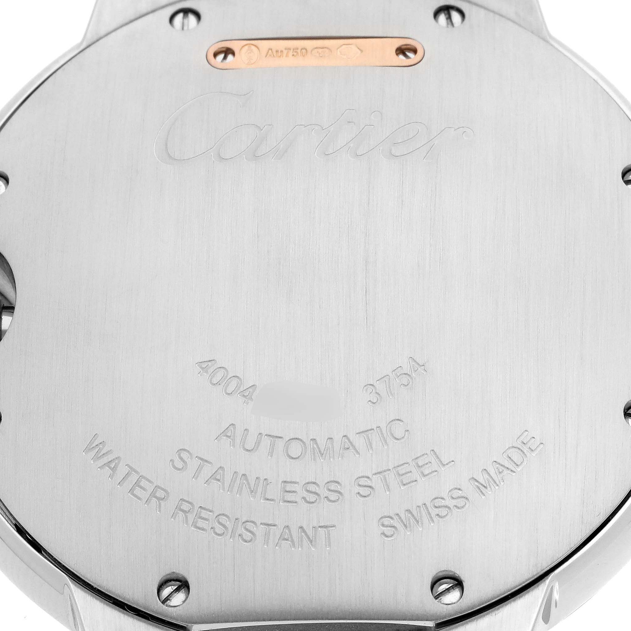 The image shows the back case of a Cartier Ballon Bleu W3BB0004 Women's Steel and Gold (two tone) Silver Dial W3BB0004 Women's Steel and Gold (two tone) Silver Dial watch, highlighting engravings and screws.