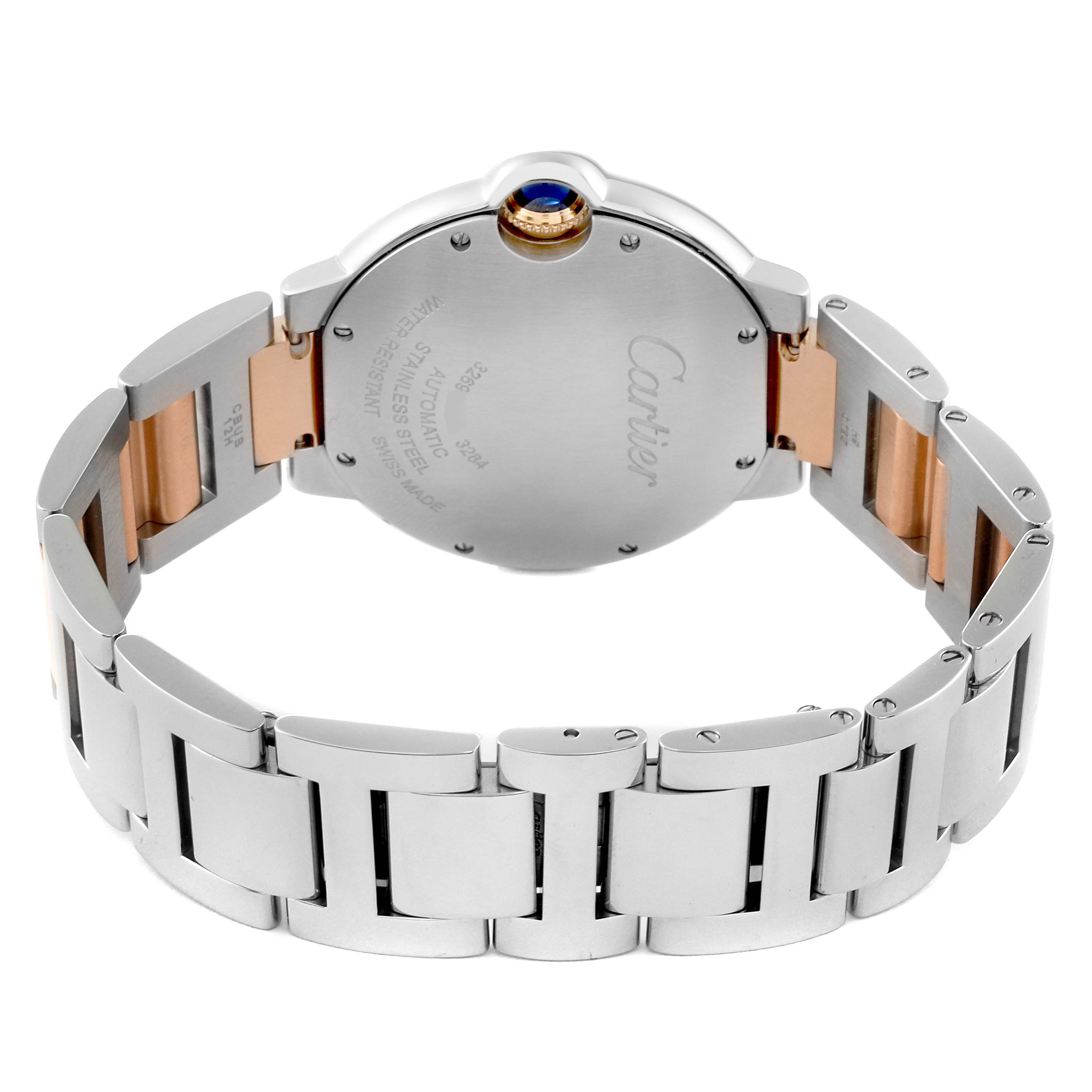 The image shows the back view of a Ballon Bleu model by Cartier, highlighting its case back, bracelet, and crown.