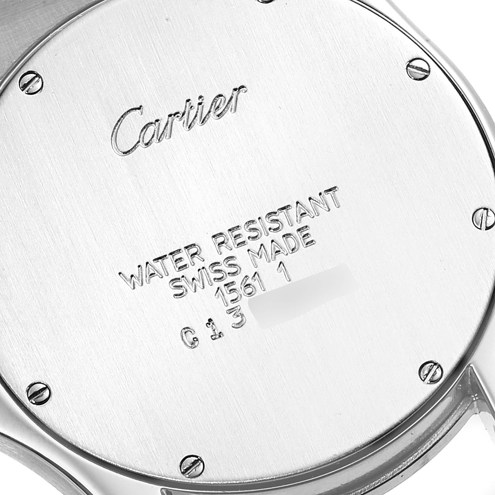 The image shows the back case of a Cartier Santos 1561 Men
s Stainless Steel White Dial 1561 Men
s Stainless Steel White Dial watch at a close-up angle, displaying engraving details and screws.