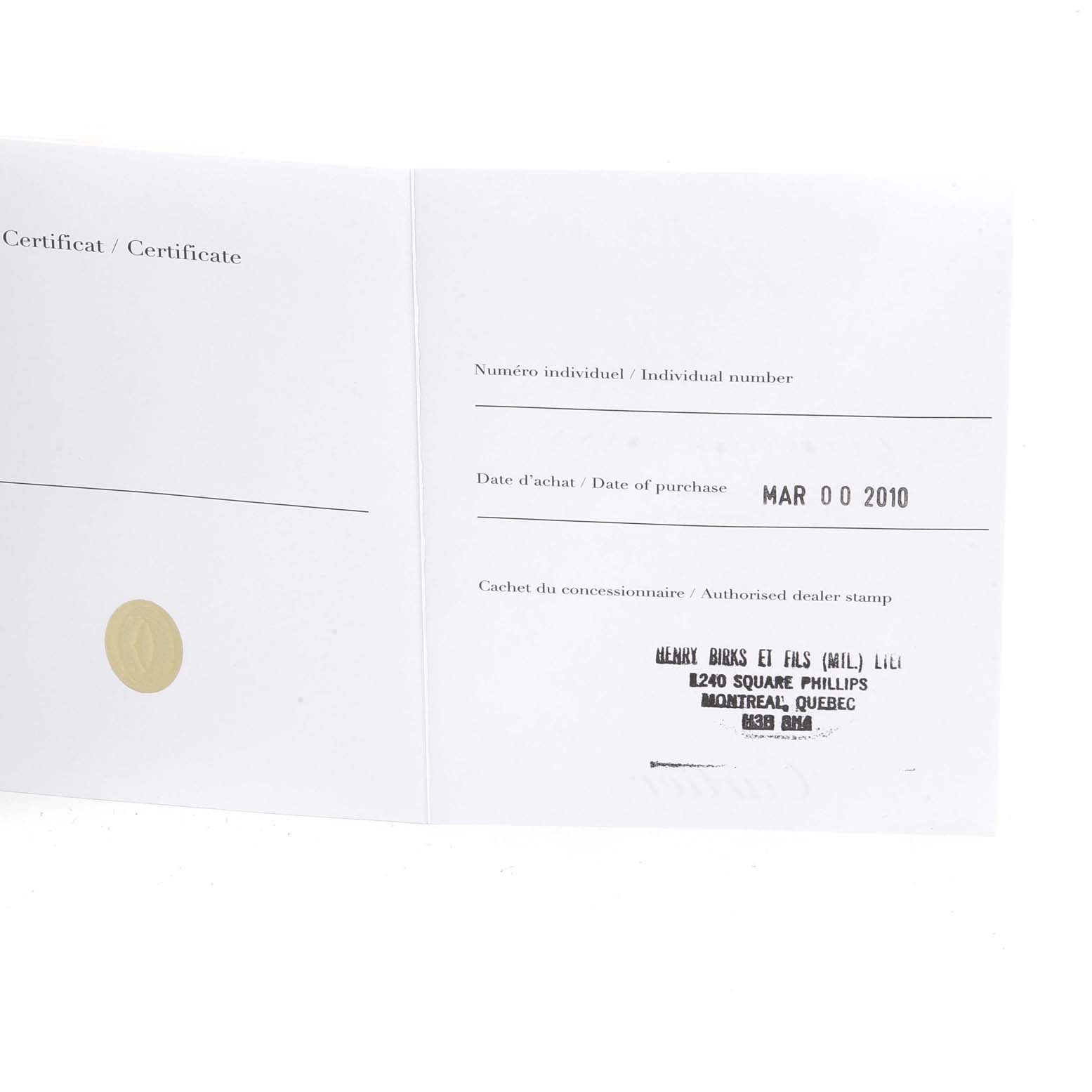 This image shows the certificate documentation for a Cartier Roadster W62025V3 Men
s Stainless Steel Silver Dial W62025V3 Men
s Stainless Steel Silver Dial watch, including the date of purchase and dealer stamp.