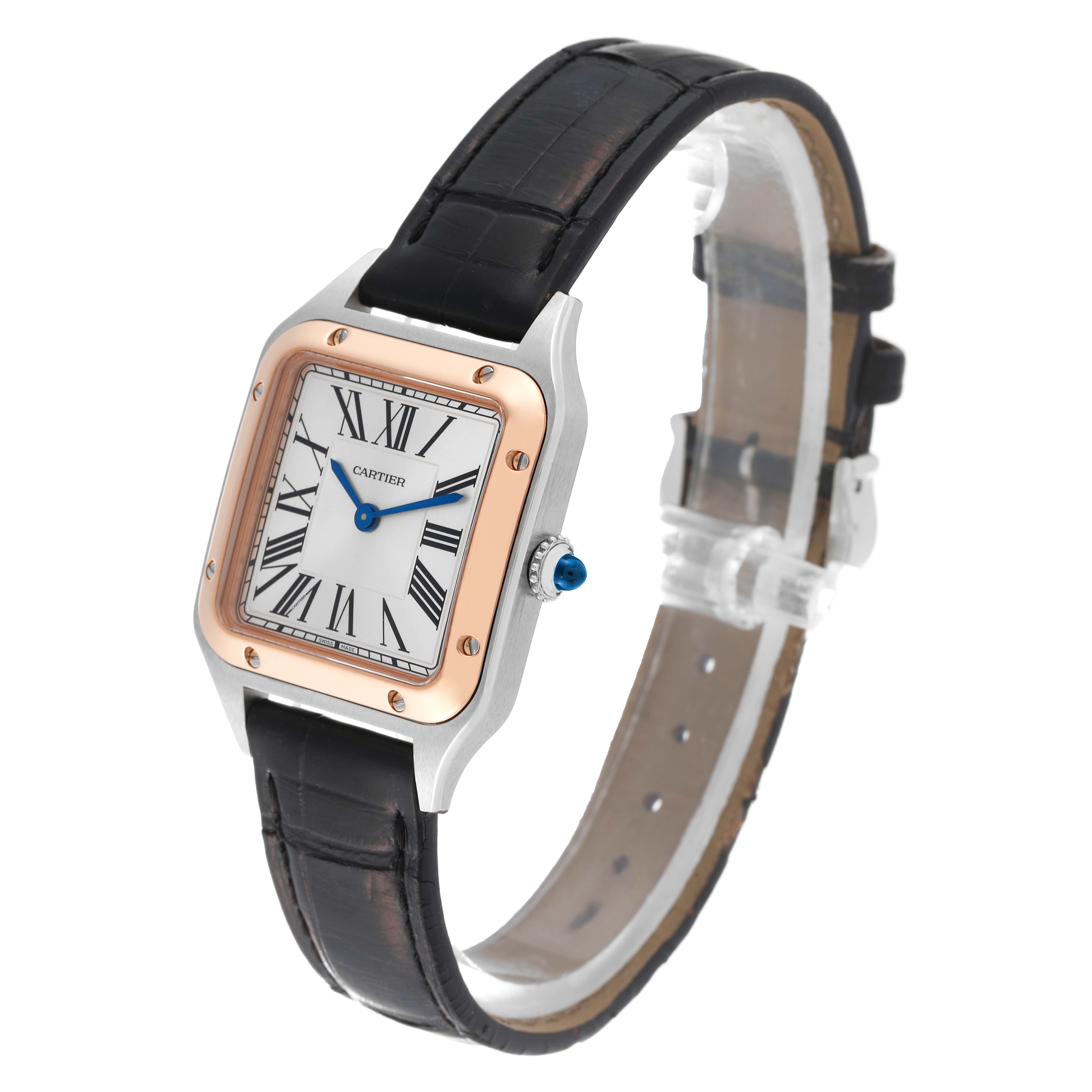 The image shows a Cartier Santos W2SA0012 Women's Steel and Gold (two tone) Silver Dial W2SA0012 Women's Steel and Gold (two tone) Silver Dial watch at an angle highlighting the face, bezel, crown, and leather strap.