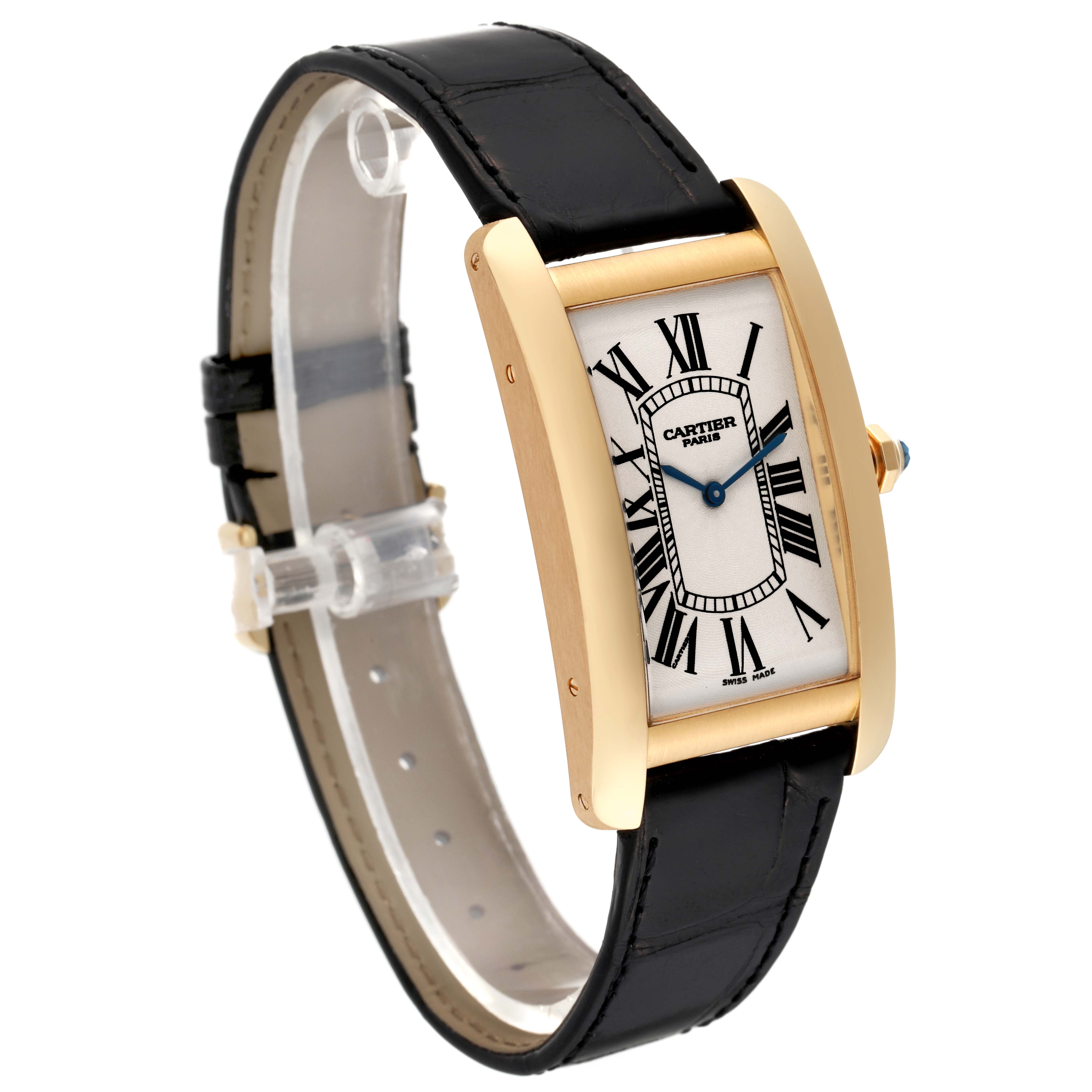 The image shows a Cartier Tank Americaine 1735 Men's Yellow Gold Silver Dial 1735 Men's Yellow Gold Silver Dial watch at a three-quarter angle, highlighting its rectangular face, roman numerals, gold casing, and leather strap.