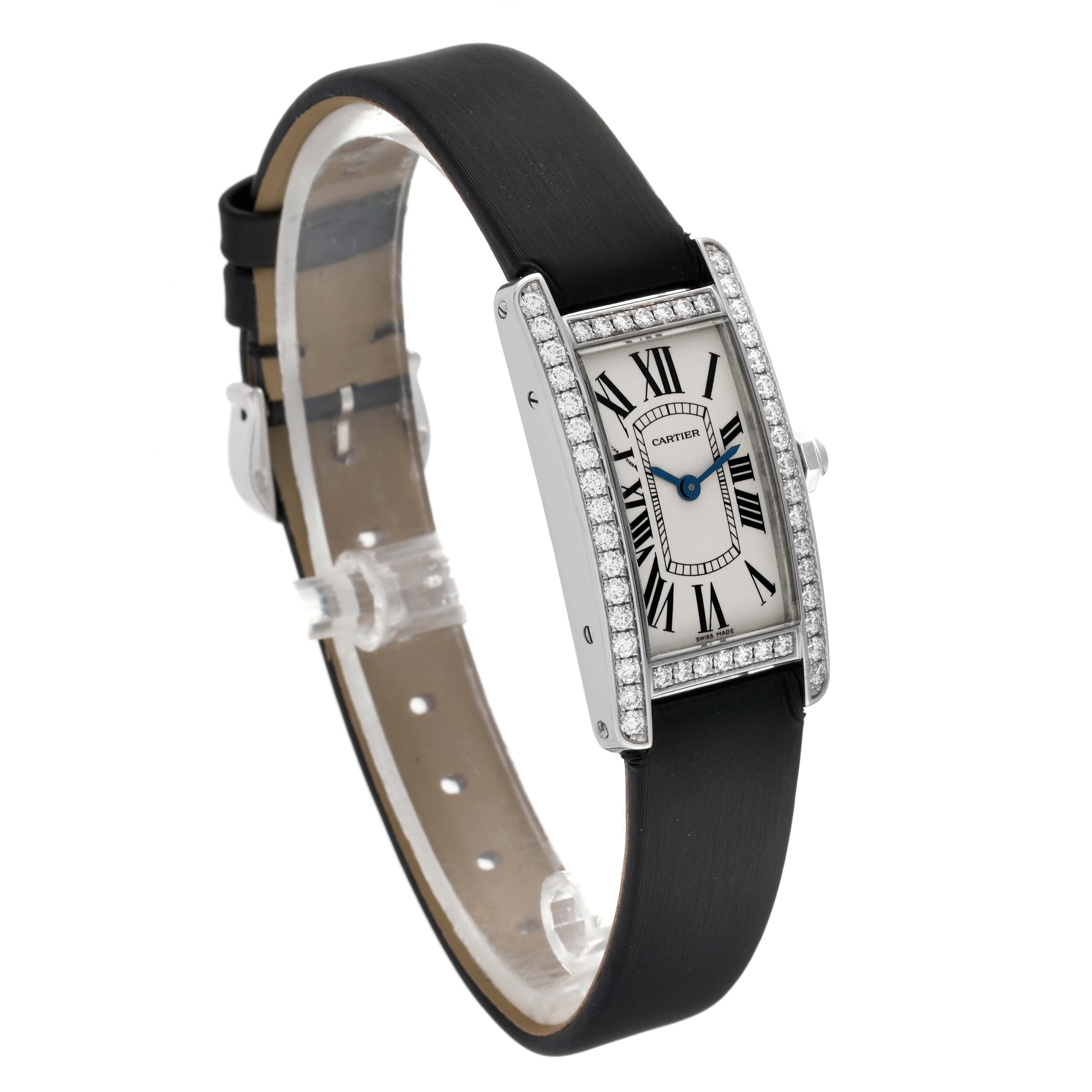 The Cartier Tank Americaine WB707331 Women's White Gold Silver Dial WB707331 Women's White Gold Silver Dial watch is shown at a three-quarter angle, displaying its face, bezel, and strap.