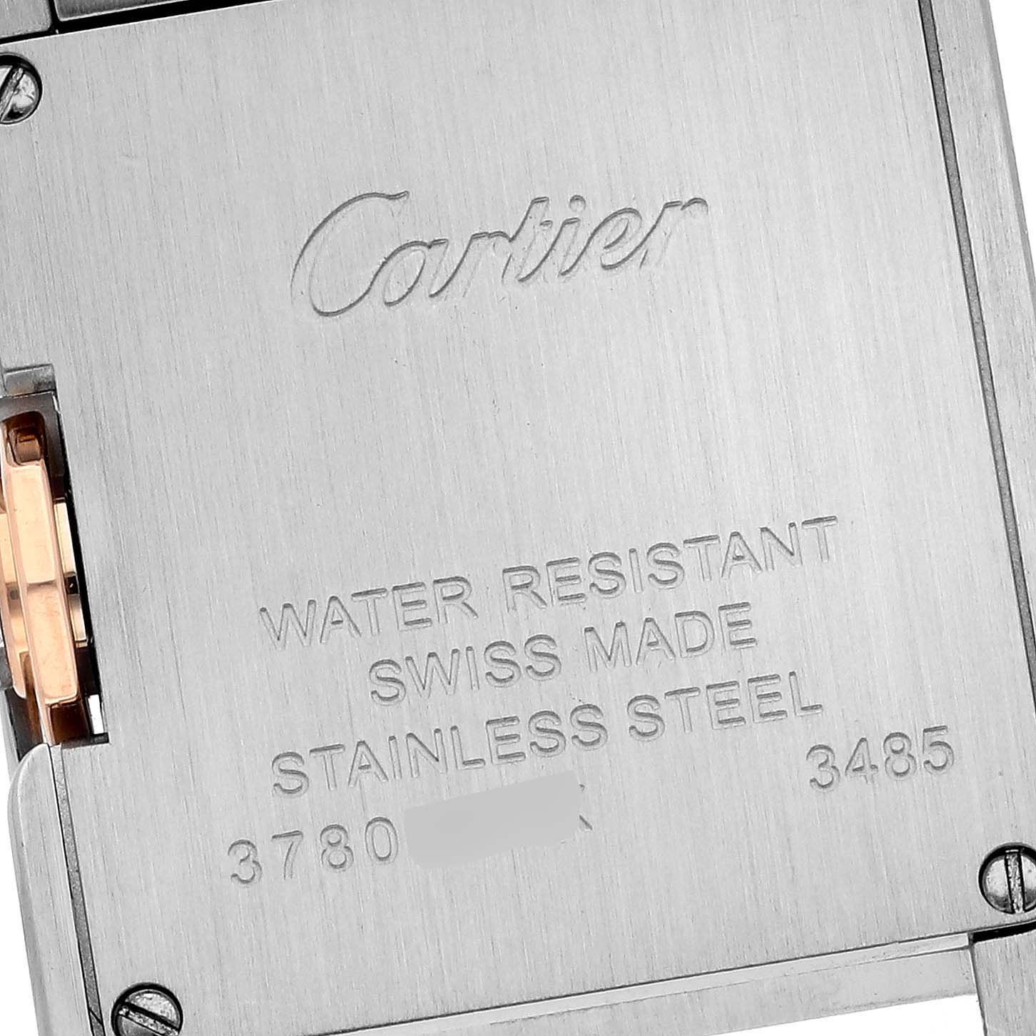 The image shows the back case of a Tank Anglaise model by Cartier, highlighting its inscriptions and materials.