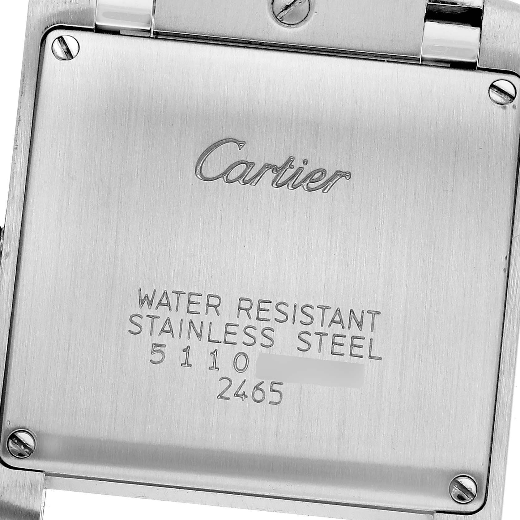 This image shows the back casing of the Cartier Tank Française watch, highlighting its stainless steel material and water resistance.