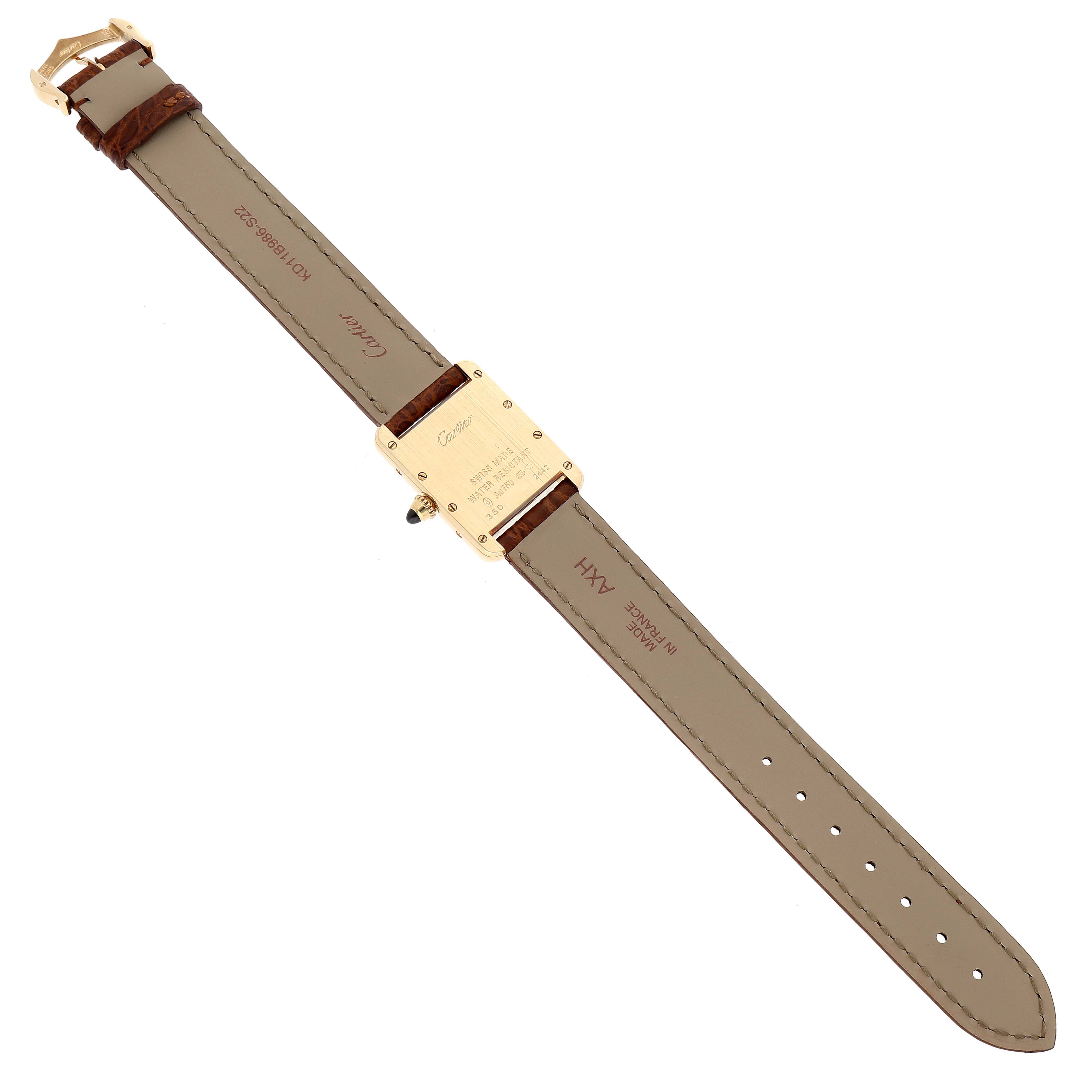 The image shows the back of a Cartier Tank Louis W1529856 Women's Yellow Gold Silver Dial W1529856 Women's Yellow Gold Silver Dial watch, highlighting the case back and leather straps.