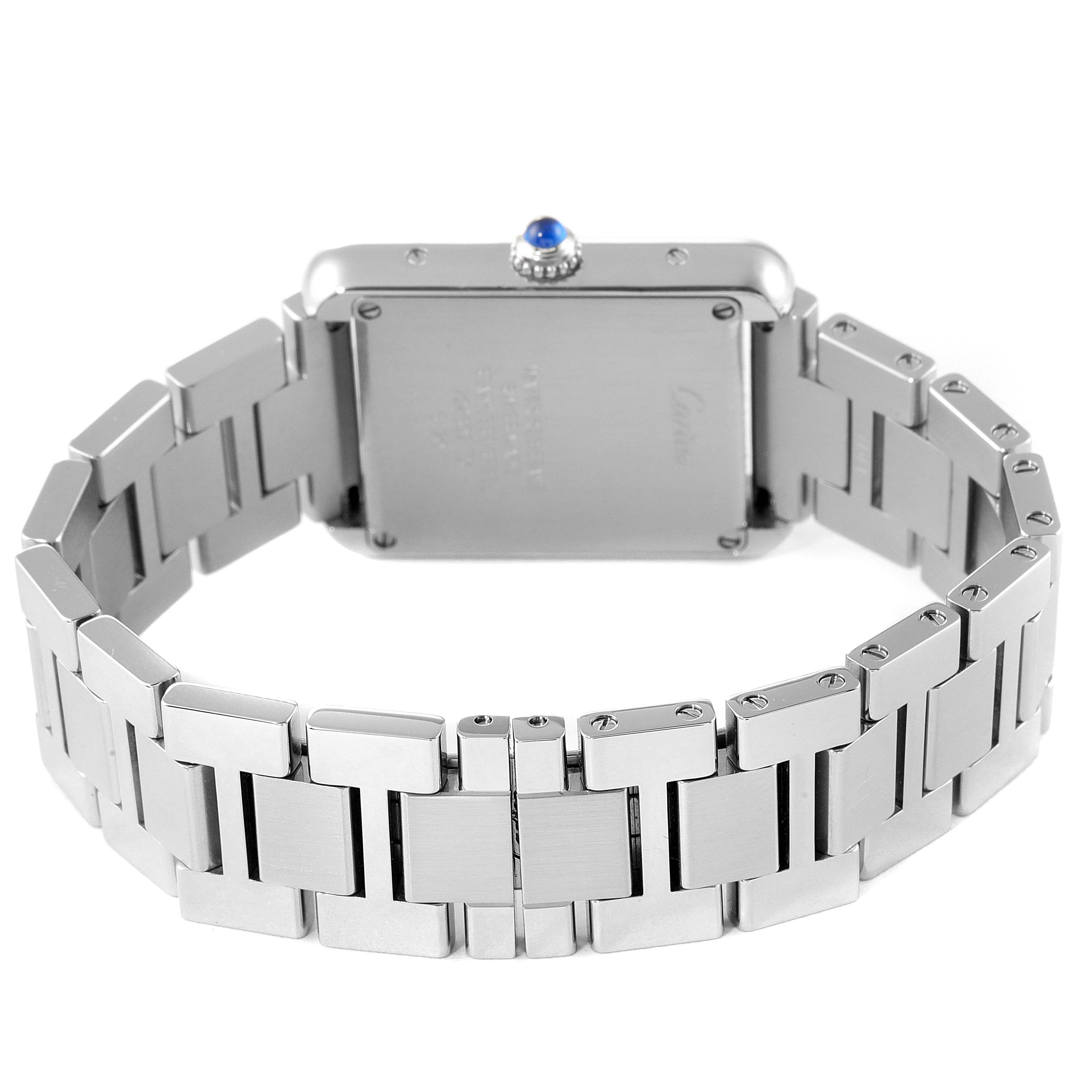 The image shows the back view of the Cartier Tank Solo W5200013 Women
s Stainless Steel Silver Dial W5200013 Women
s Stainless Steel Silver Dial watch, highlighting its metal bracelet and case back.