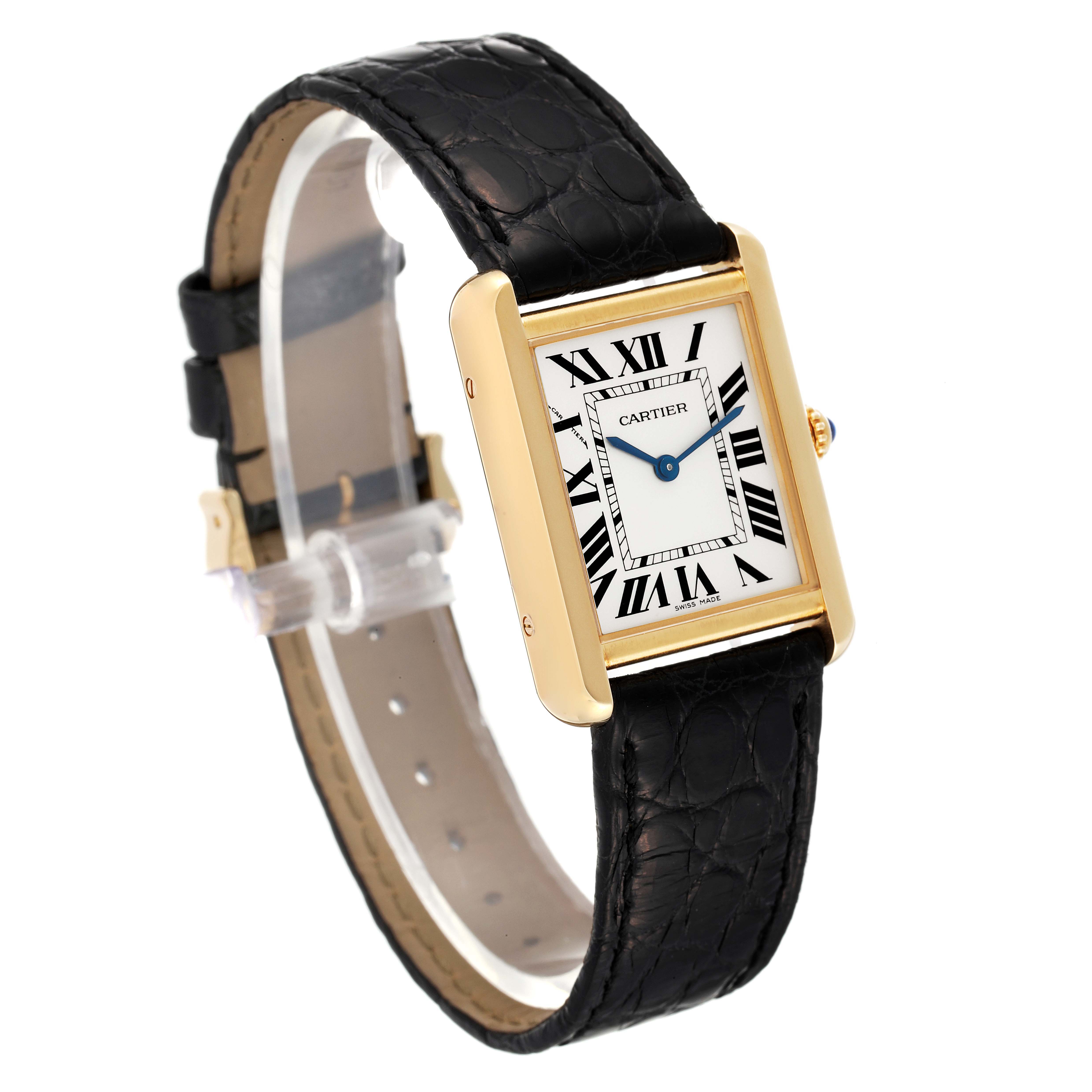The Cartier Tank Solo W1018755 Women's Yellow Gold Silver Dial W1018755 Women's Yellow Gold Silver Dial watch is shown at an oblique angle, displaying its face, strap, and gold case.