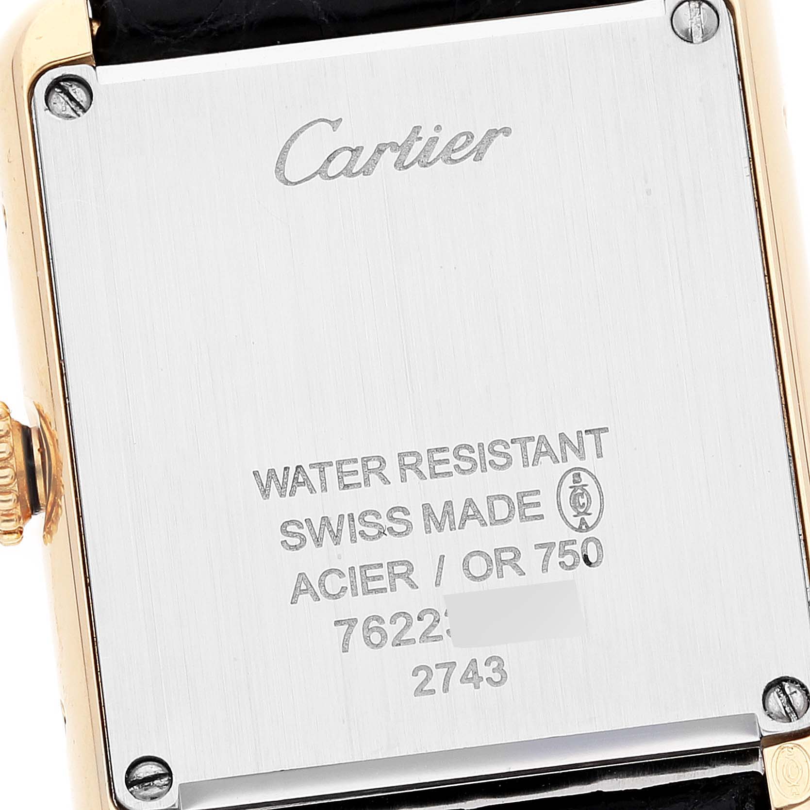This image shows the back case of a Cartier Tank Solo W1018755 Women's Yellow Gold Silver Dial W1018755 Women's Yellow Gold Silver Dial watch, displaying the brand, model, and specifications.