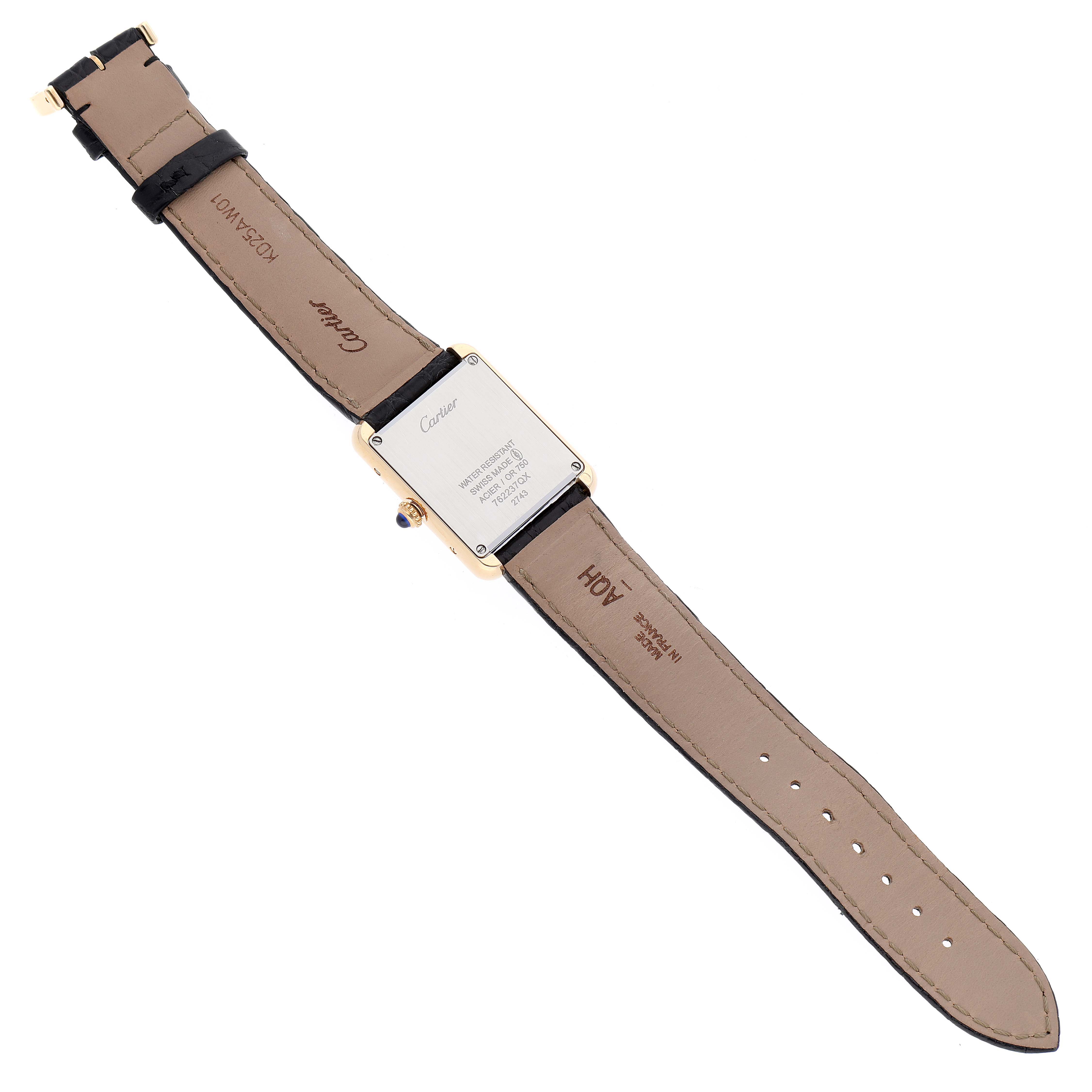 The image shows the back side and strap of a Cartier Tank Solo W1018755 Women's Yellow Gold Silver Dial W1018755 Women's Yellow Gold Silver Dial watch, highlighting the case back and leather strap.