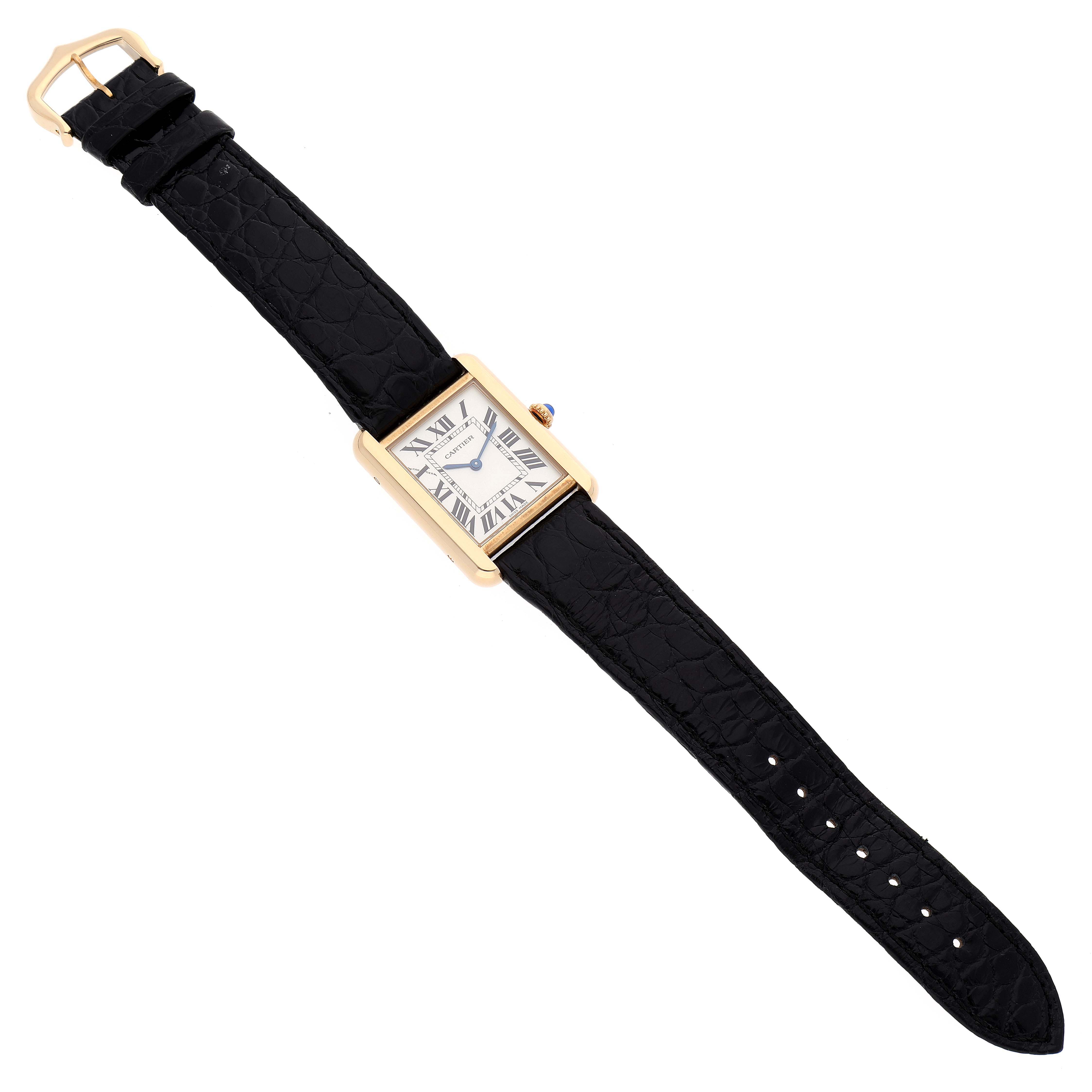 The image shows a full view of the Cartier Tank Solo W1018755 Women's Yellow Gold Silver Dial W1018755 Women's Yellow Gold Silver Dial watch, highlighting the rectangular face, gold case, and black leather strap.