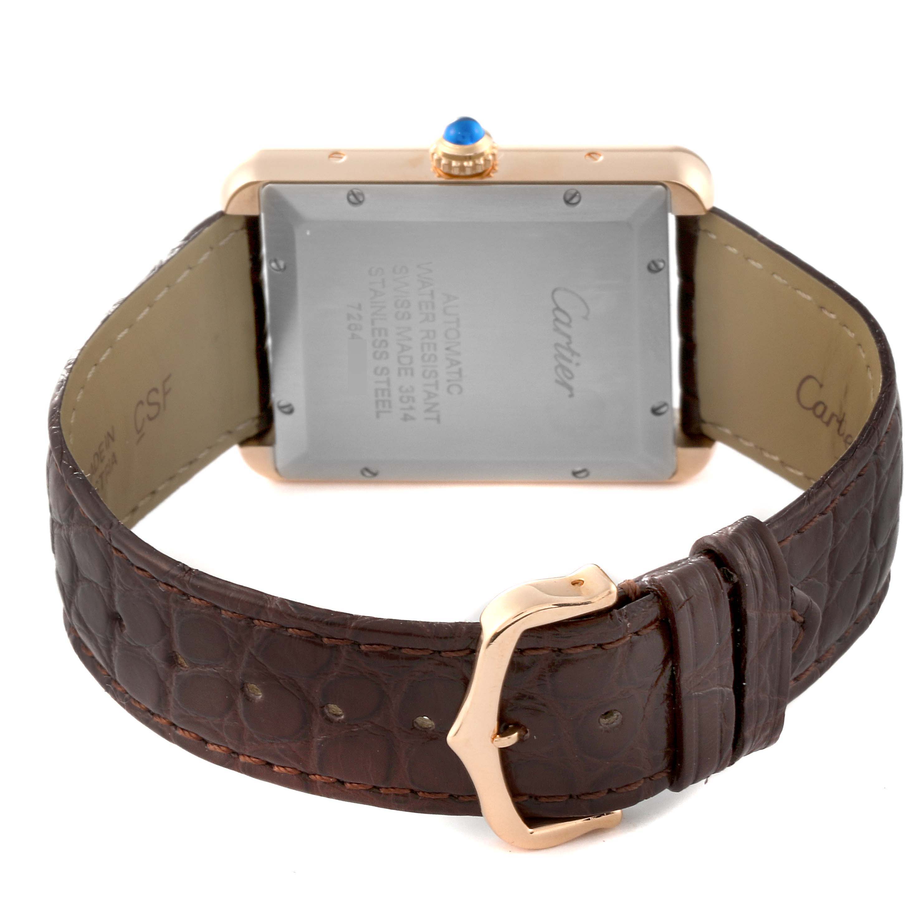 This image shows the back, crown, and strap of a Cartier Tank Solo W5200026 Men
s Steel and Gold (two tone) Silver Dial W5200026 Men
s Steel and Gold (two tone) Silver Dial watch with a brown leather strap.