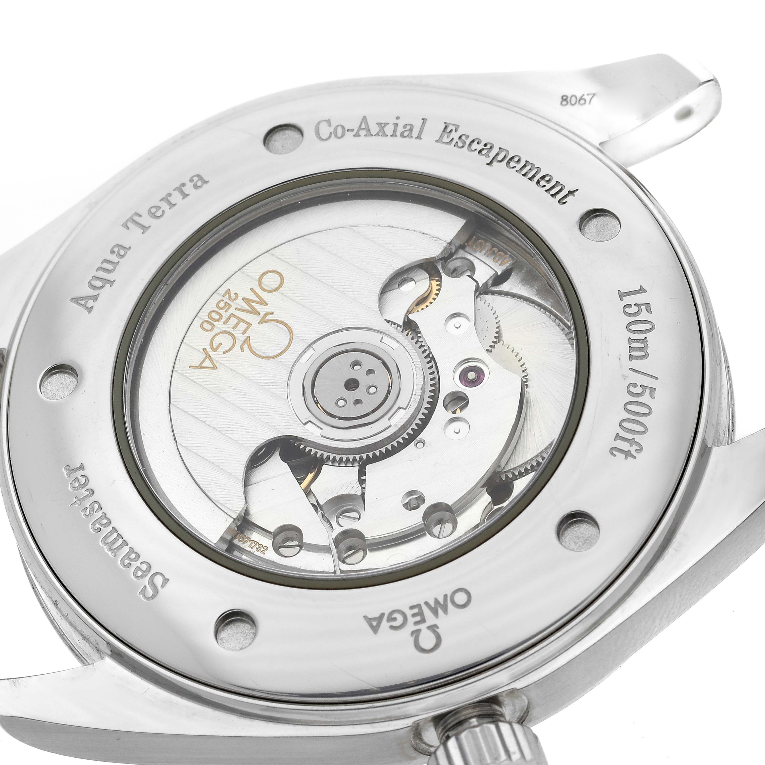 This image shows the back view of an Omega Aqua Terra 2502.34.00 Men's Stainless Steel Silver Dial 2502.34.00 Men's Stainless Steel Silver Dial watch, revealing its internal mechanical parts and inscriptions.